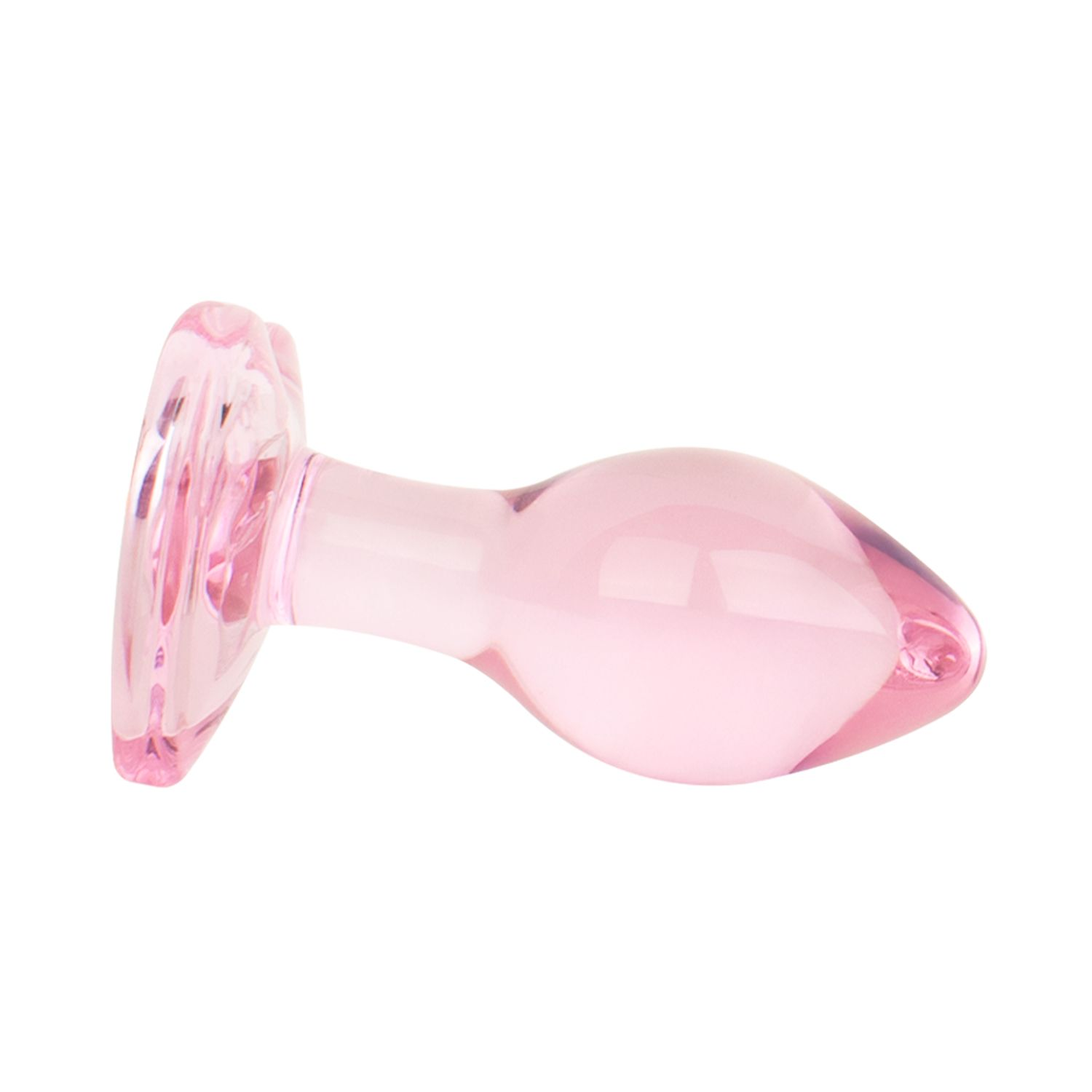 Ein rosa Glas-Analplug liegt auf weißem Grund. Die Basis ist rund und die Spitze glatt und verjüngt sich.