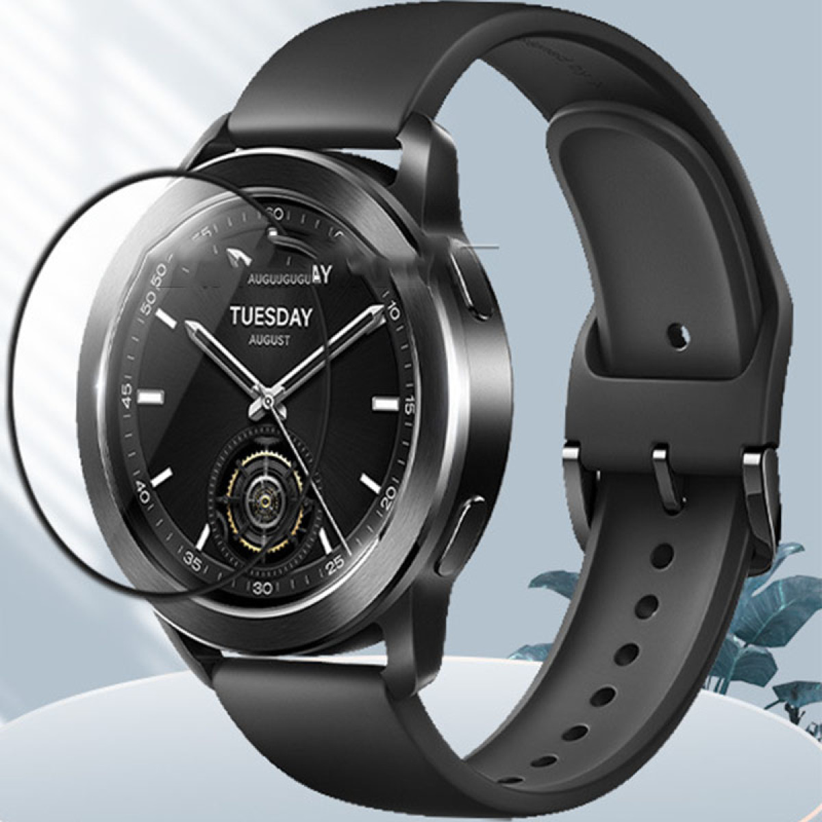 Smartwatch nero con protezione schermo, mostra giorno e data. L'orologio ha cinturino nero e lunetta in metallo.