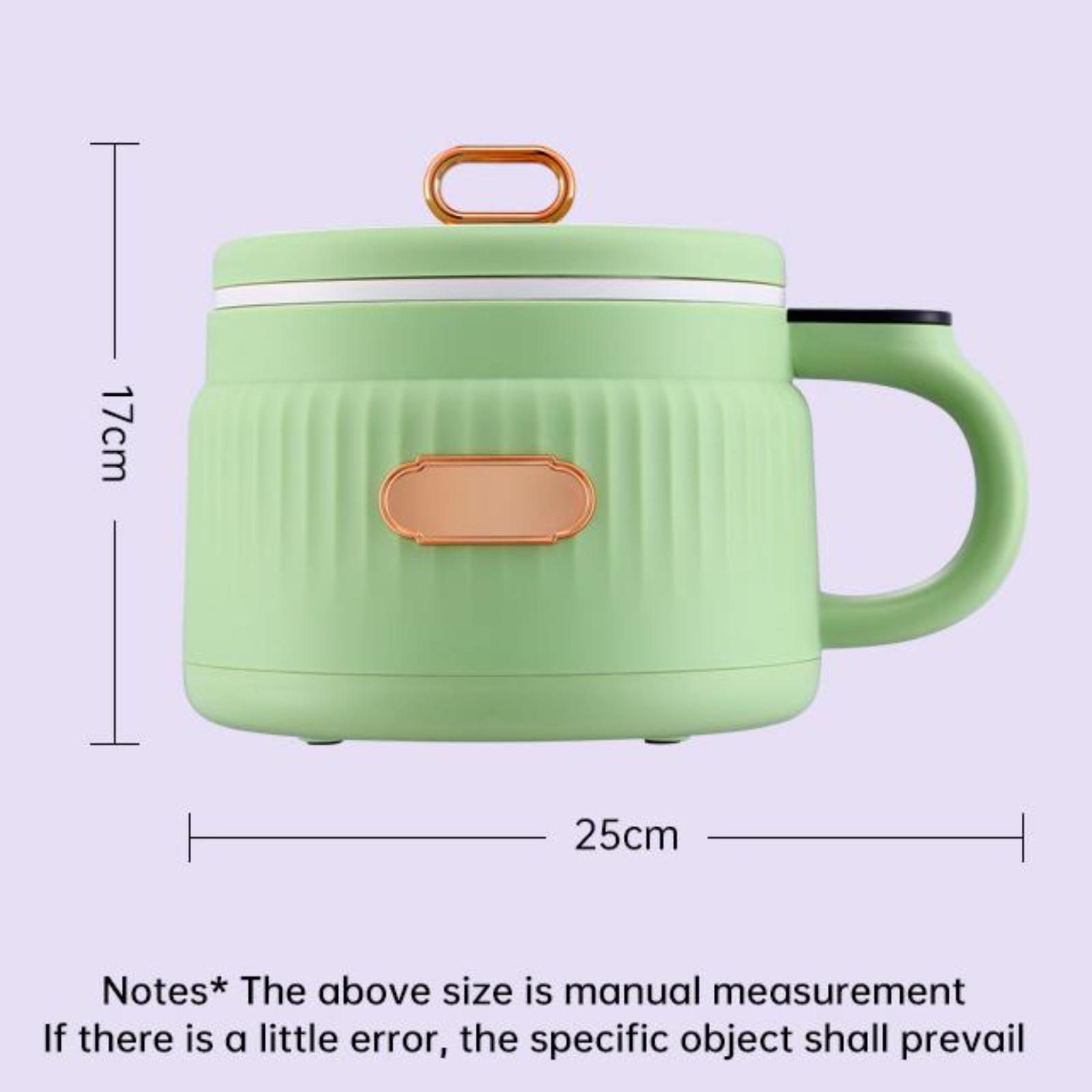 Grüner Elektrokocher, mit den angegebenen Abmessungen: 17 cm Höhe, 25 cm Breite. Hinweise zu manuellen Messungen.