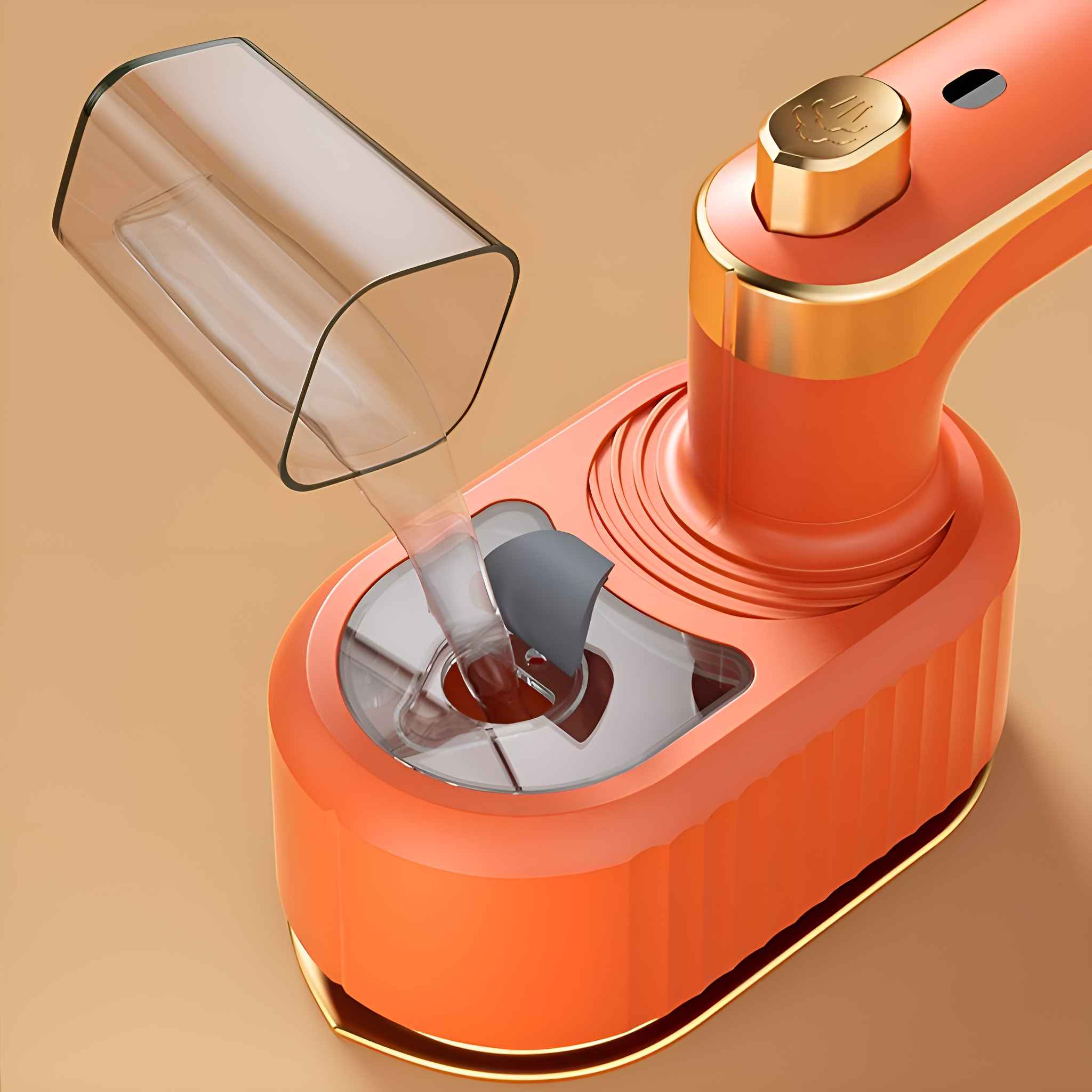 Nahaufnahme eines orangefarbenen und goldenen Handdampfers mit einem Wasserfüllbehälter.