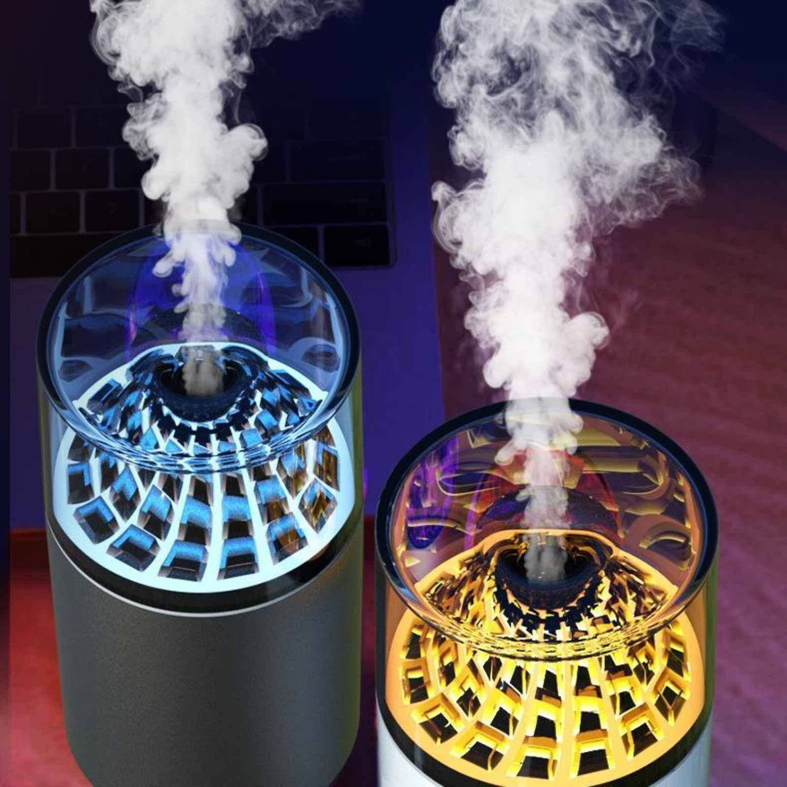 Zwei Diffusoren für ätherische Öle, einer weiß und einer schwarz. Die Oberseiten sind transparent mit farbenfroher Lichtanzeige.