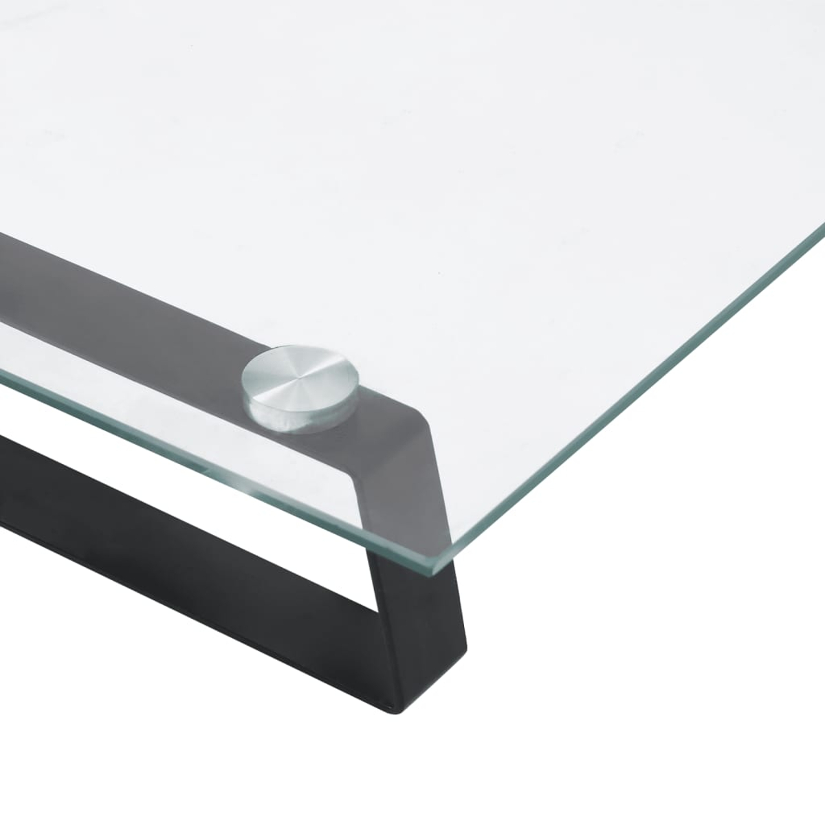 Nahaufnahme einer Glastischoberfläche mit schwarzem Metallträger.