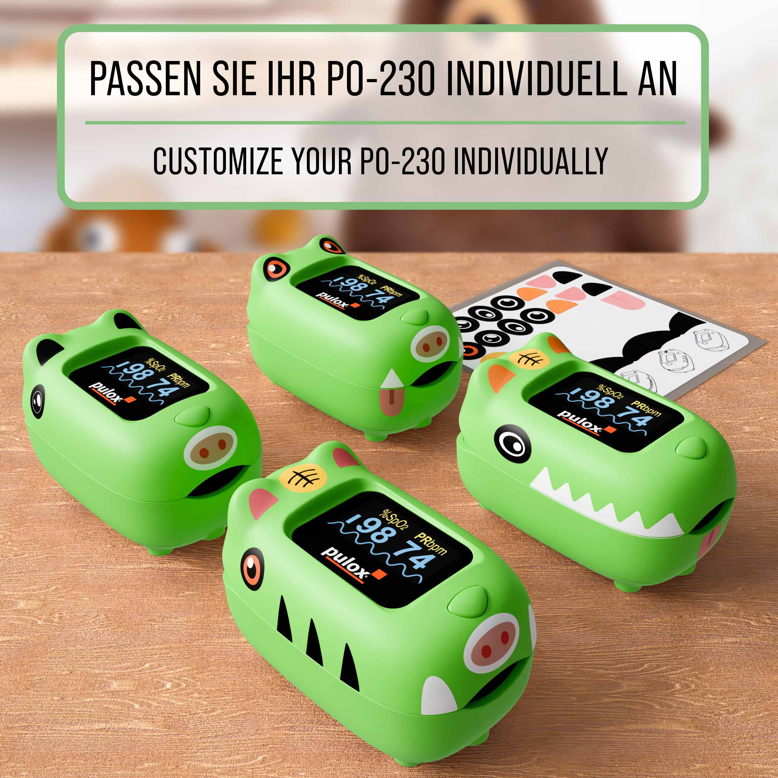 Grünes medizinisches Gerät mit Display, 4 Einheiten und Aufklebern. Auf Holzoberfläche.