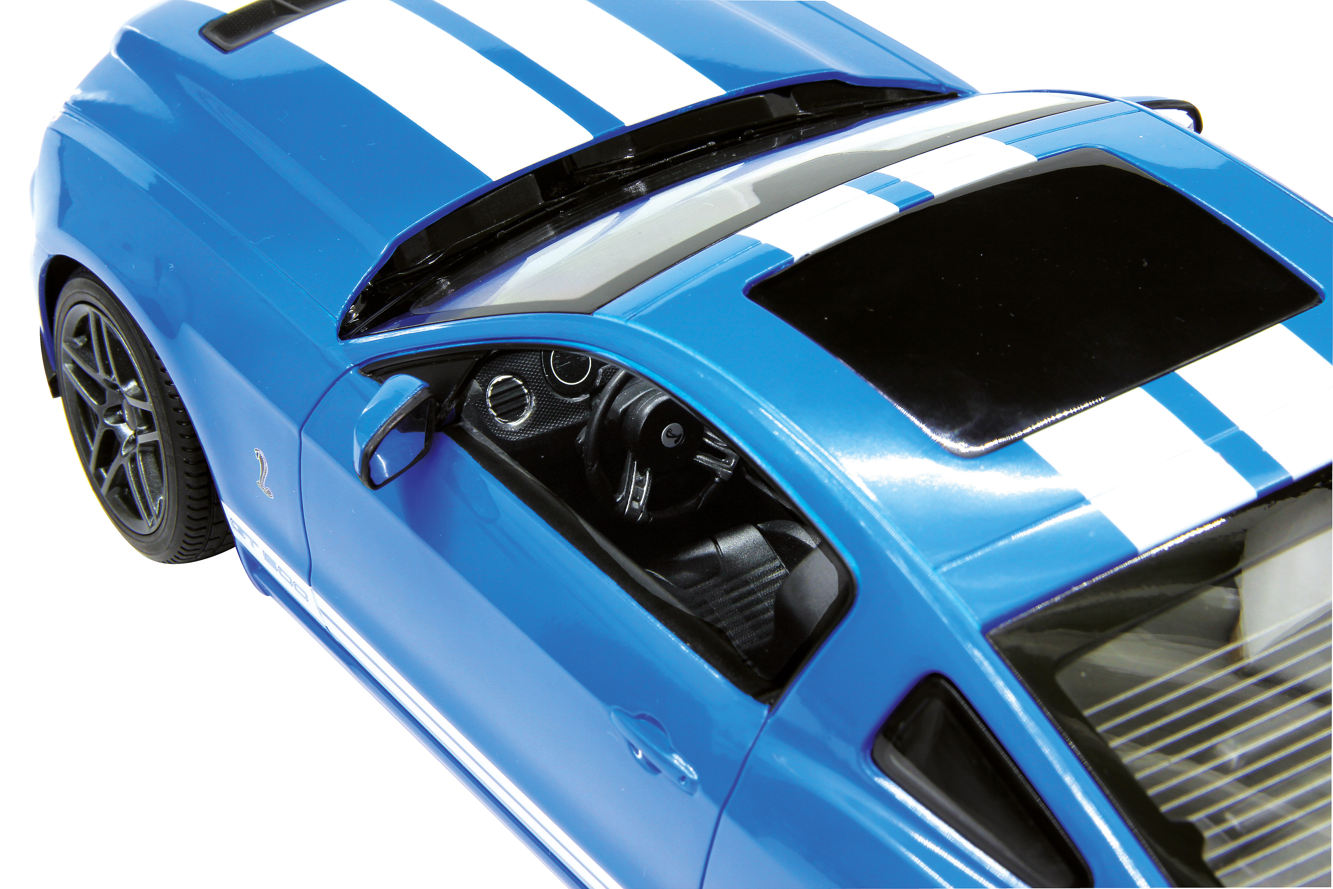 Blauer Sportwagen mit weißen Streifen, Draufsicht. Der Innenraum ist durch das Fenster sichtbar.
