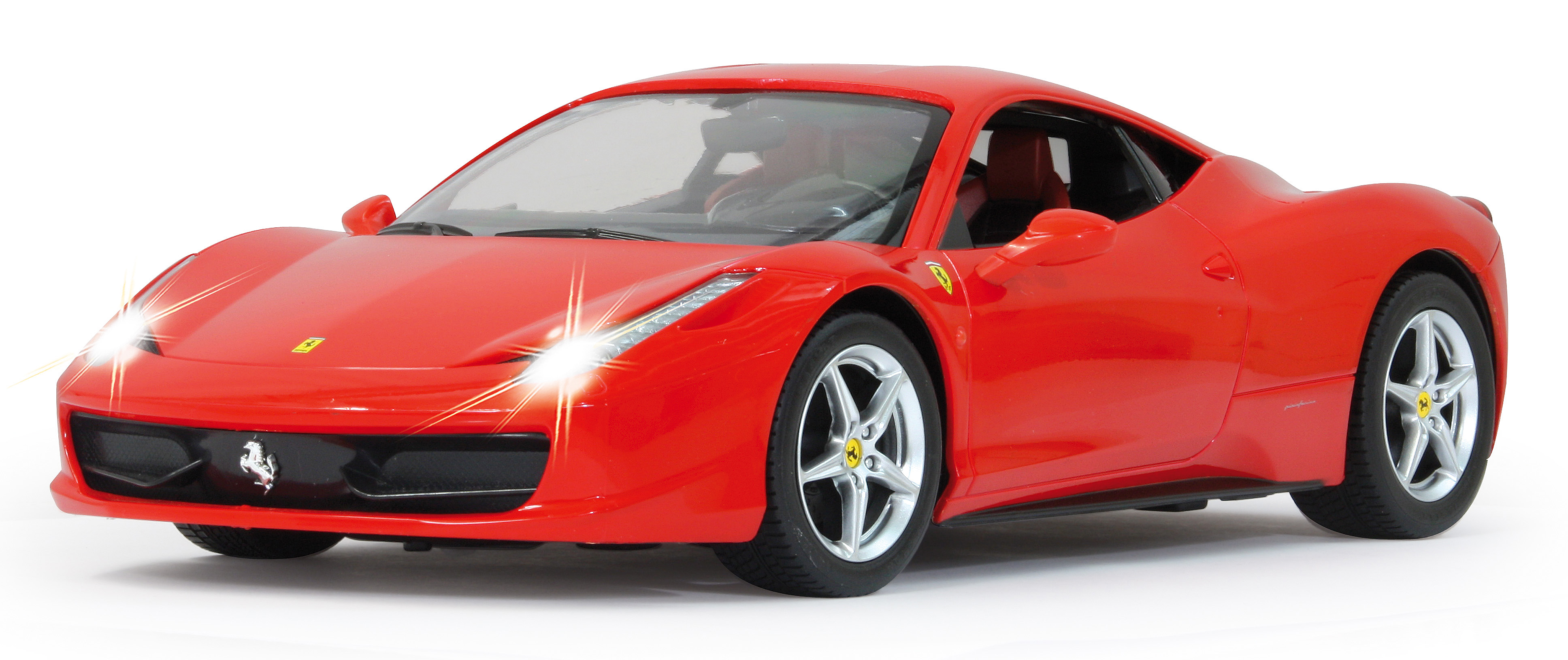 Ein rotes Ferrari-Automodell mit eingeschaltetem Licht.