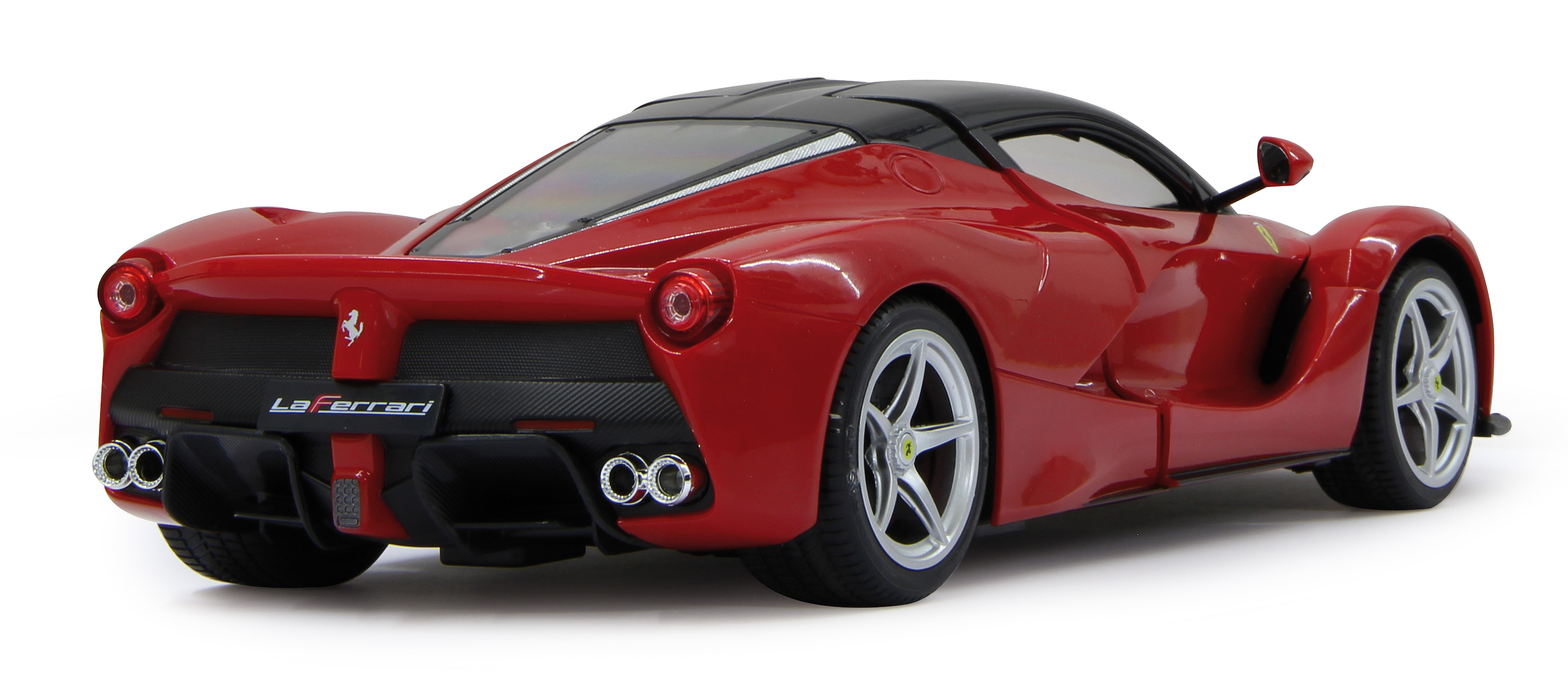 Rear view of a red Ferrari model car on a white surface.