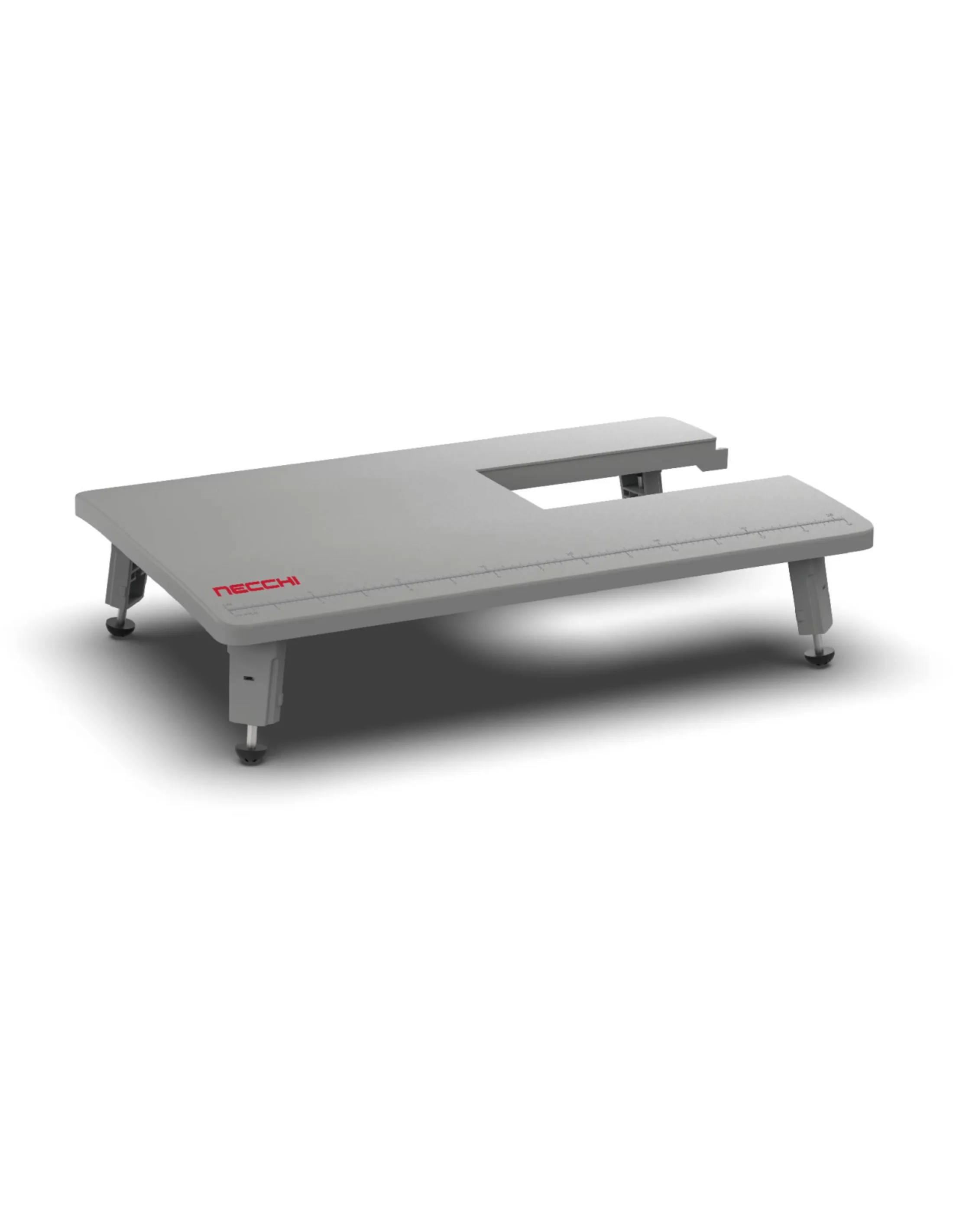 Grey sewing machine table with the brand name "NECCHI" in red. It has legs and a ruler on the surface.