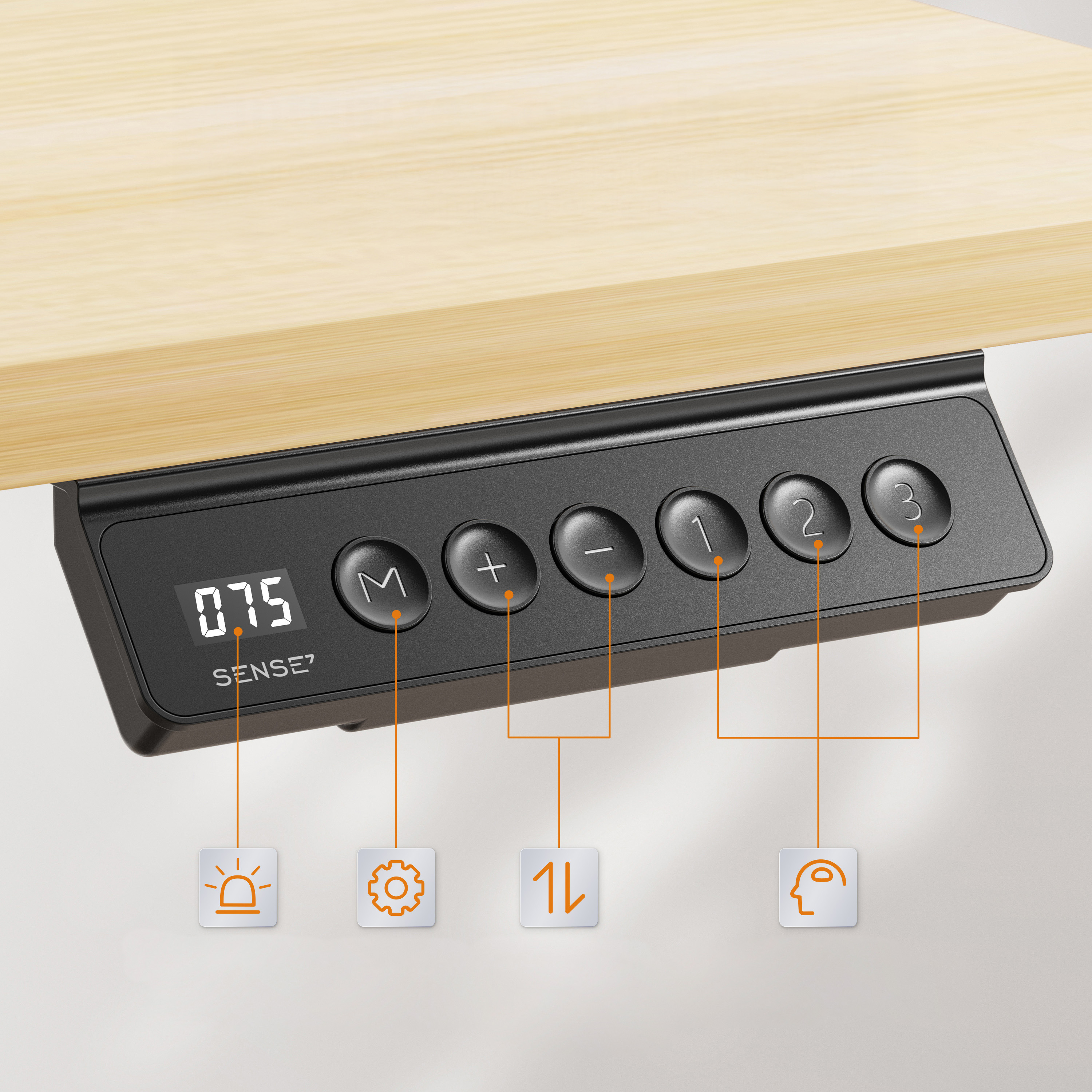 Close-up van een zwart bedieningspaneel met knoppen en een digitaal display, gemonteerd onder een houten bureau.