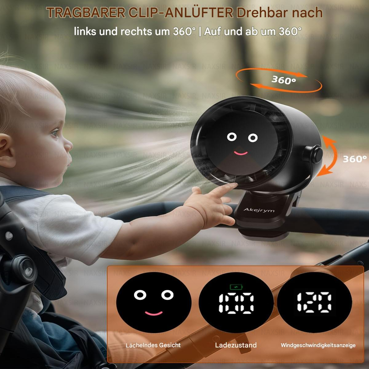 Ein Baby in einem Kinderwagen mit einem schwarzen Ventilator, der daran befestigt ist. Der Ventilator hat ein lächelndes Gesicht.