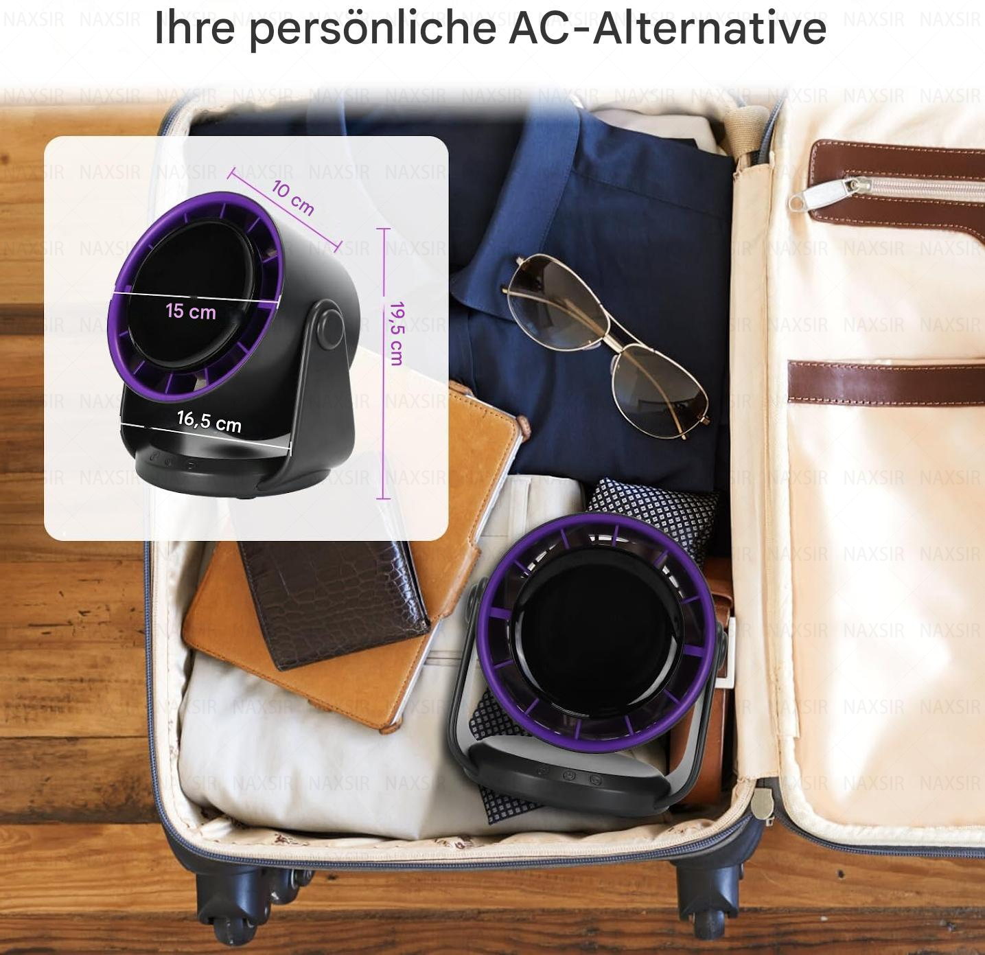 Kleiner Ventilator mit Abmessungen in einem offenen Koffer mit Kleidung und Brille.