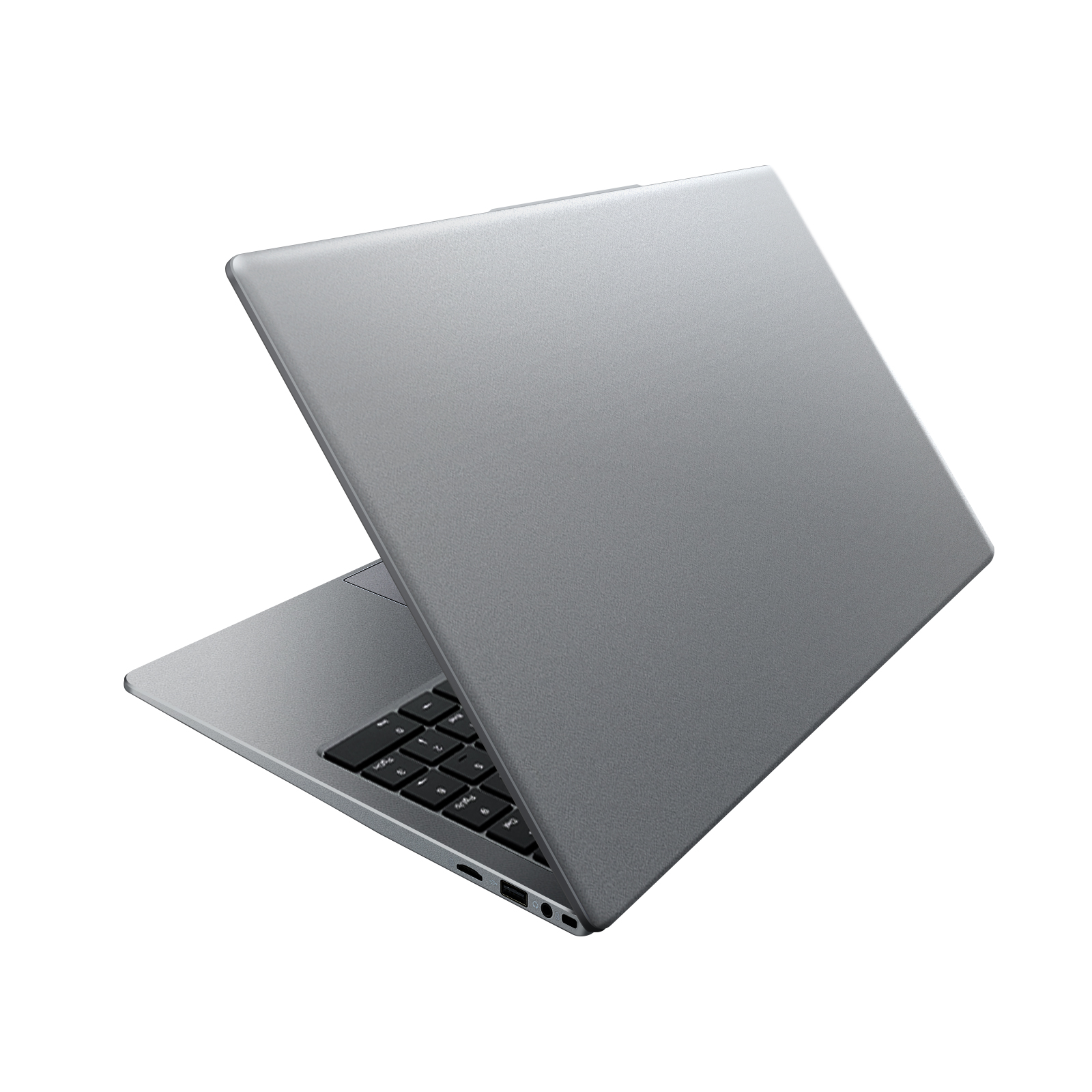 Una laptop plateada cerrada vista desde un ángulo, mostrando la parte trasera y una vista parcial del teclado.