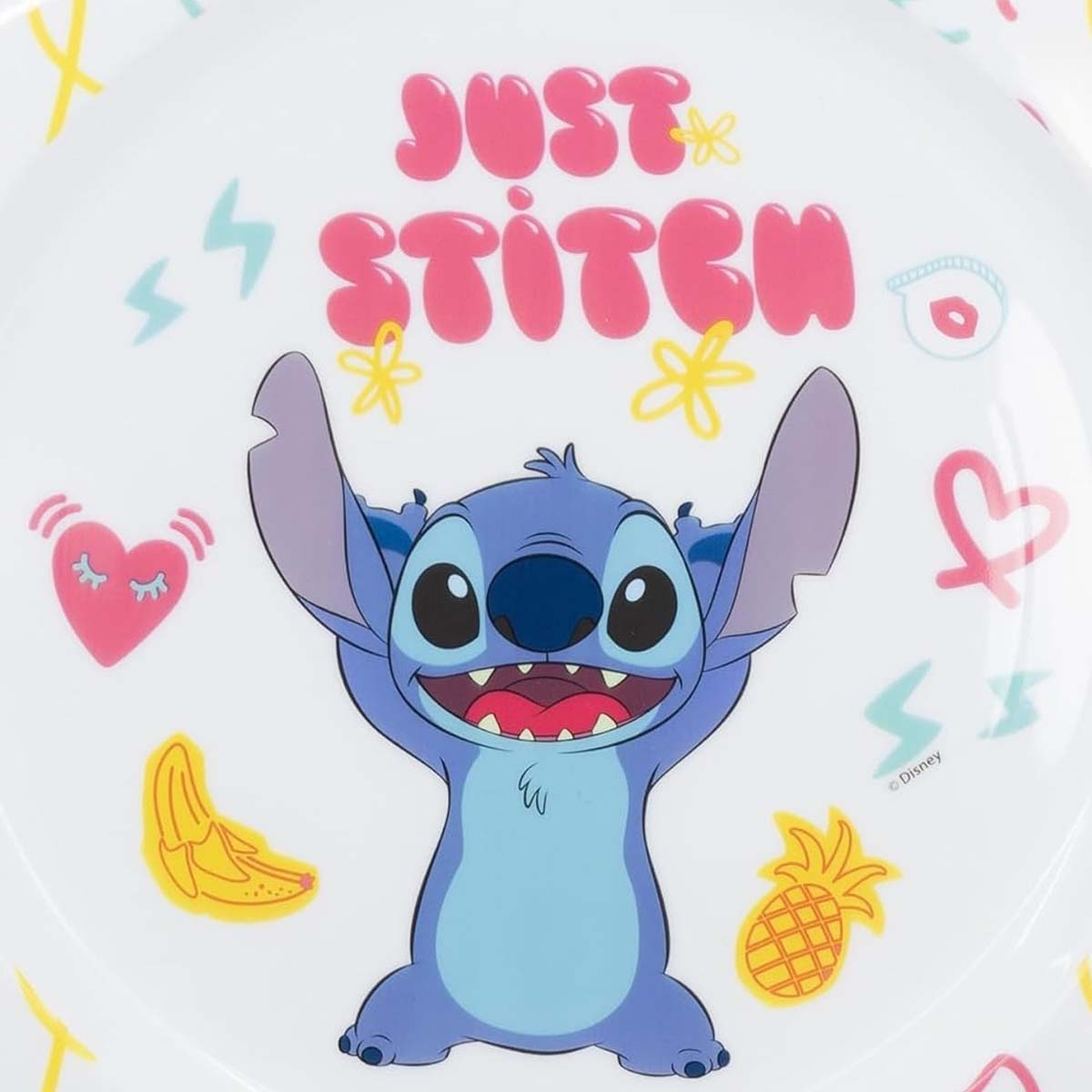 Personaggio Stitch su un piatto bianco con testo 'Just Stitch', con altre icone dei cartoni animati.