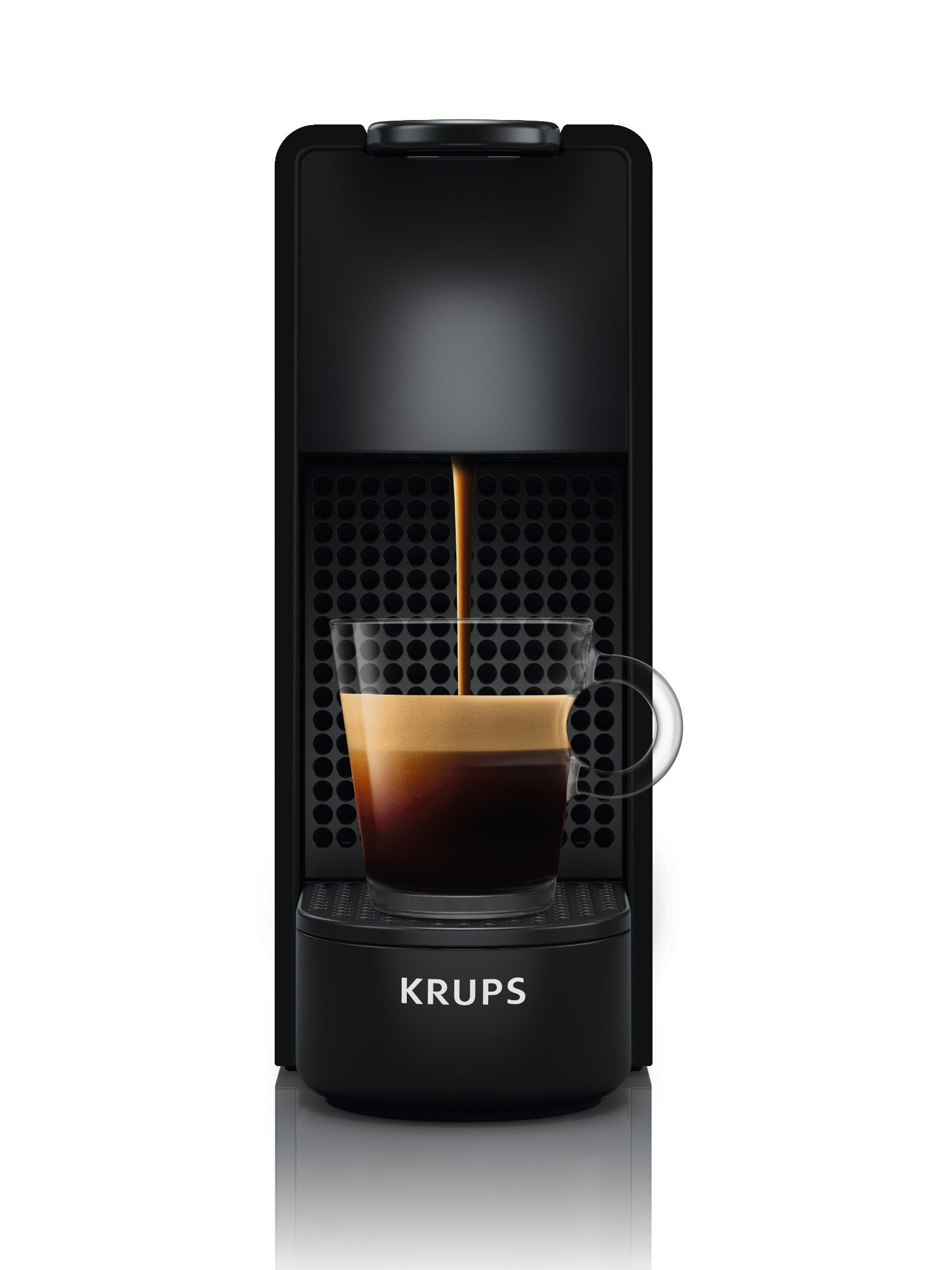 Una macchina da caffè Krups nera che eroga caffè in una tazza di vetro. Lo sfondo è bianco.