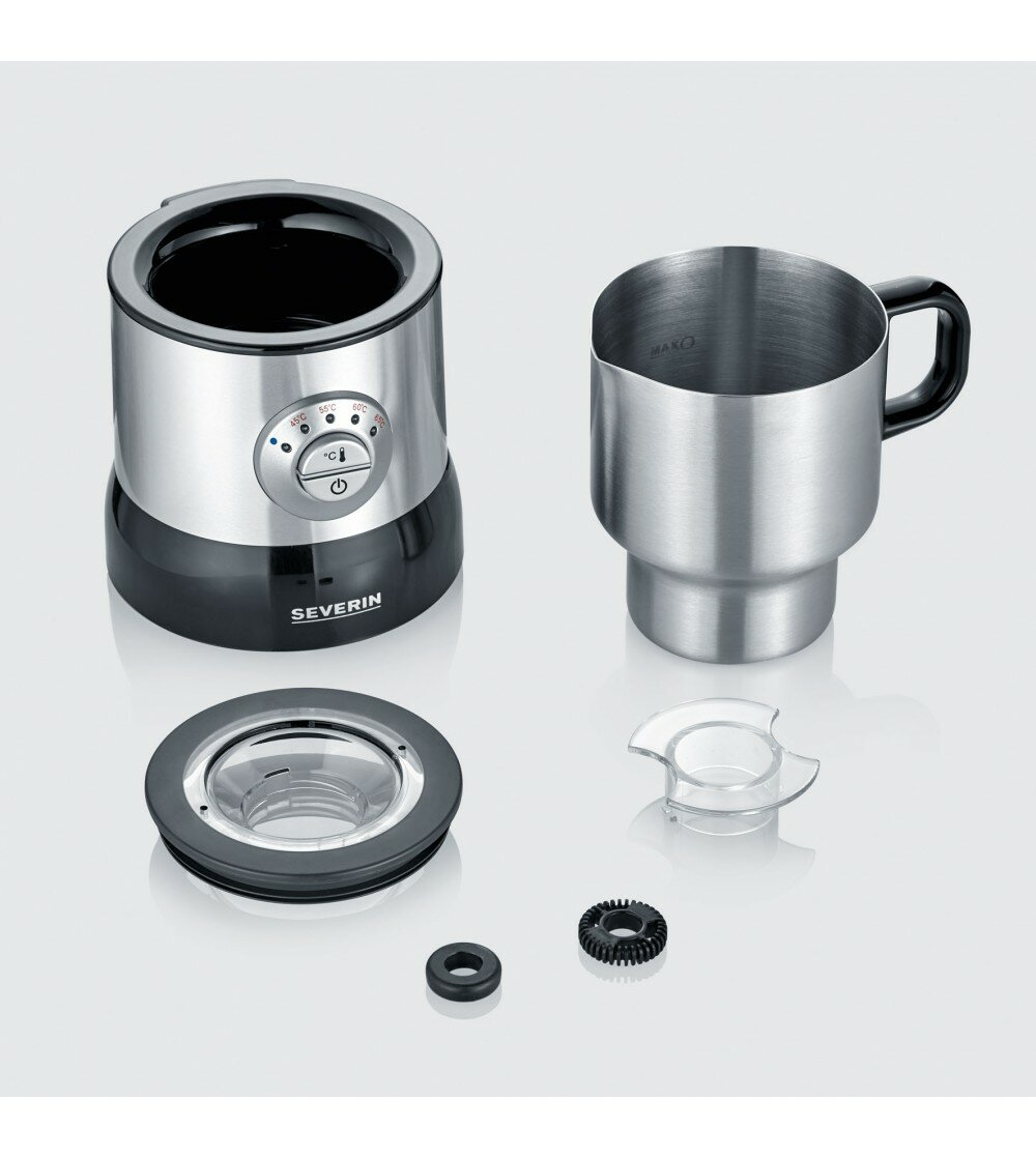Coffee machine parts. A silver base with black details and other accessories.