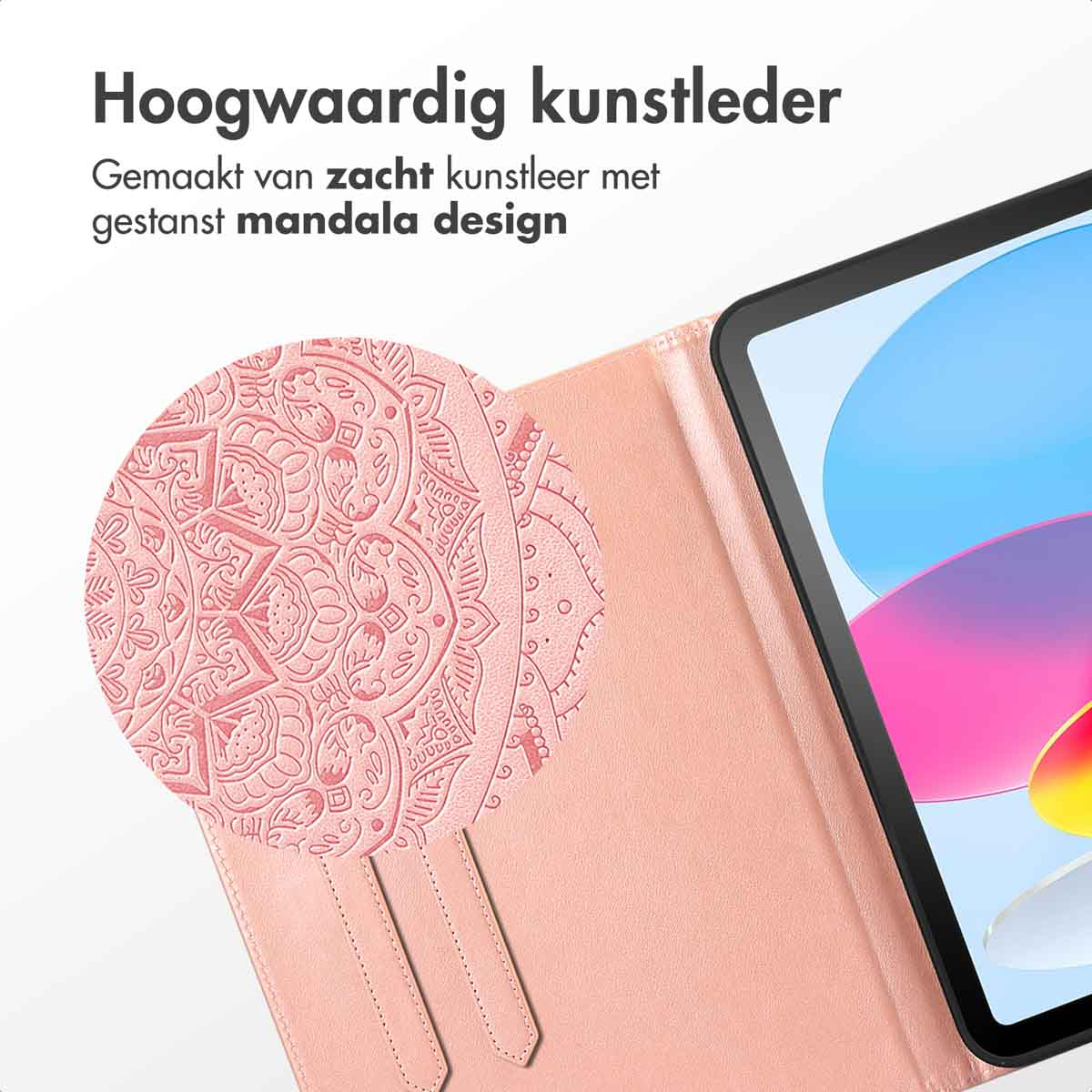 A pink tablet case with a mandala design and a tablet showing a blue and yellow screen.