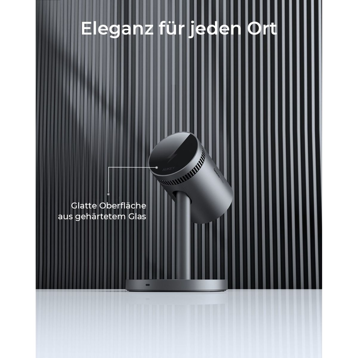 Ein zylindrischer grauer Projektor auf einem Ständer. Text sagt: 'Eleganz für jeden Ort' und 'Glatte Oberfläche aus gehärtetem Glas'.