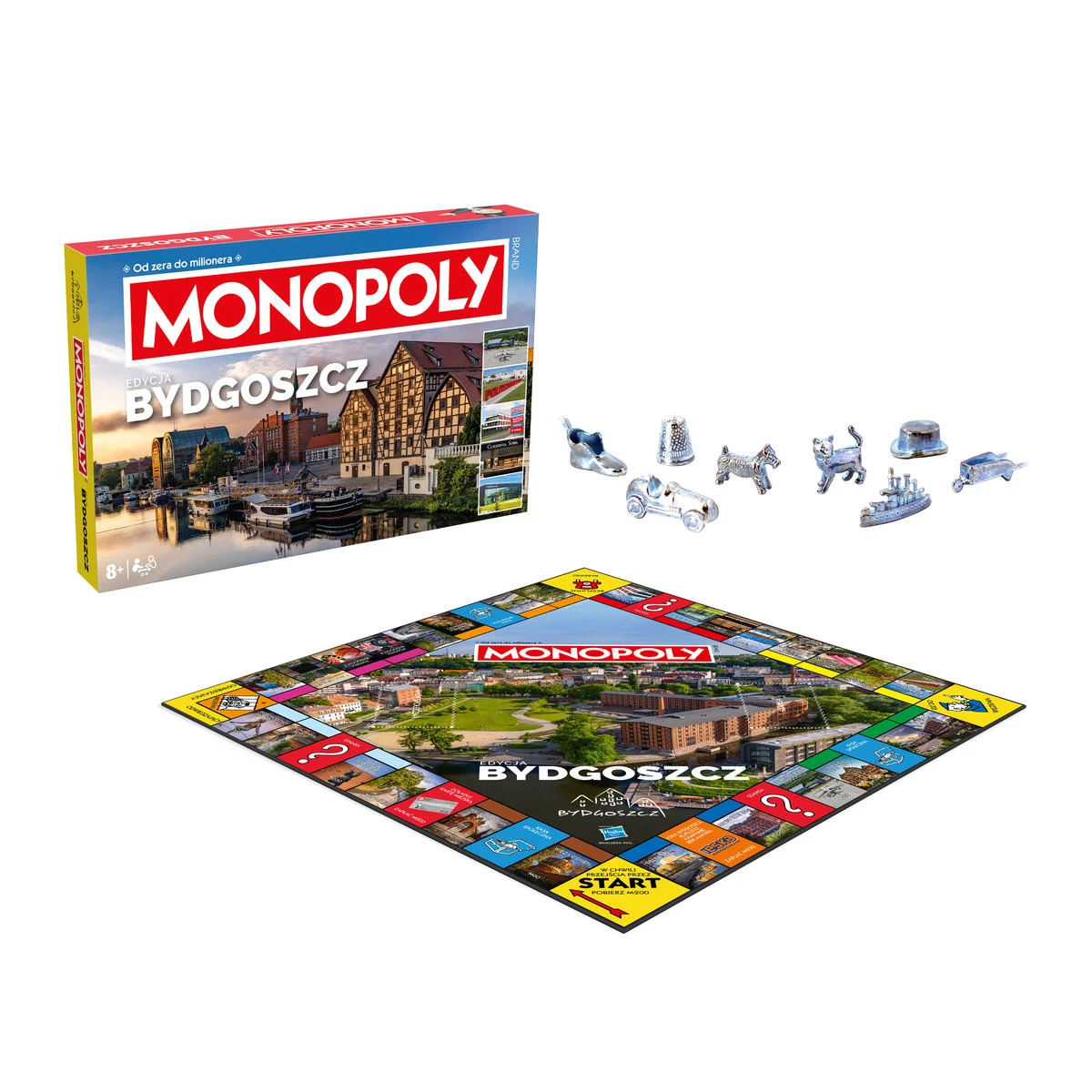 Pudełko i plansza do gry Monopoly Bydgoszcz. Plansza pokazuje zdjęcia miasta. Widoczne pionki.