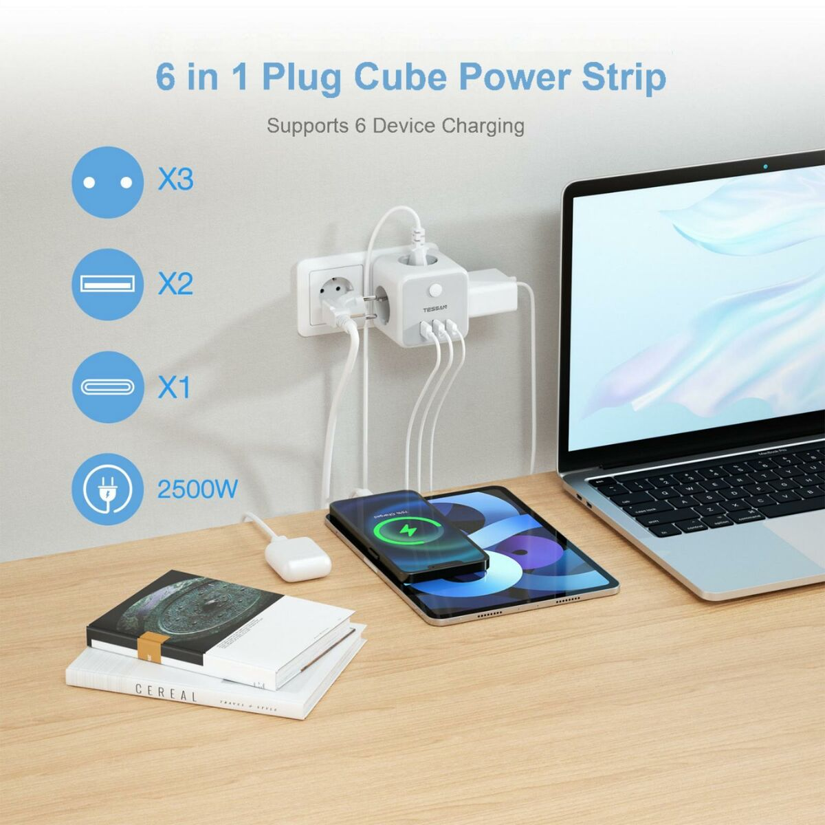 Un escritorio con múltiples dispositivos cargando a través de una regleta con puertos USB y un portátil.