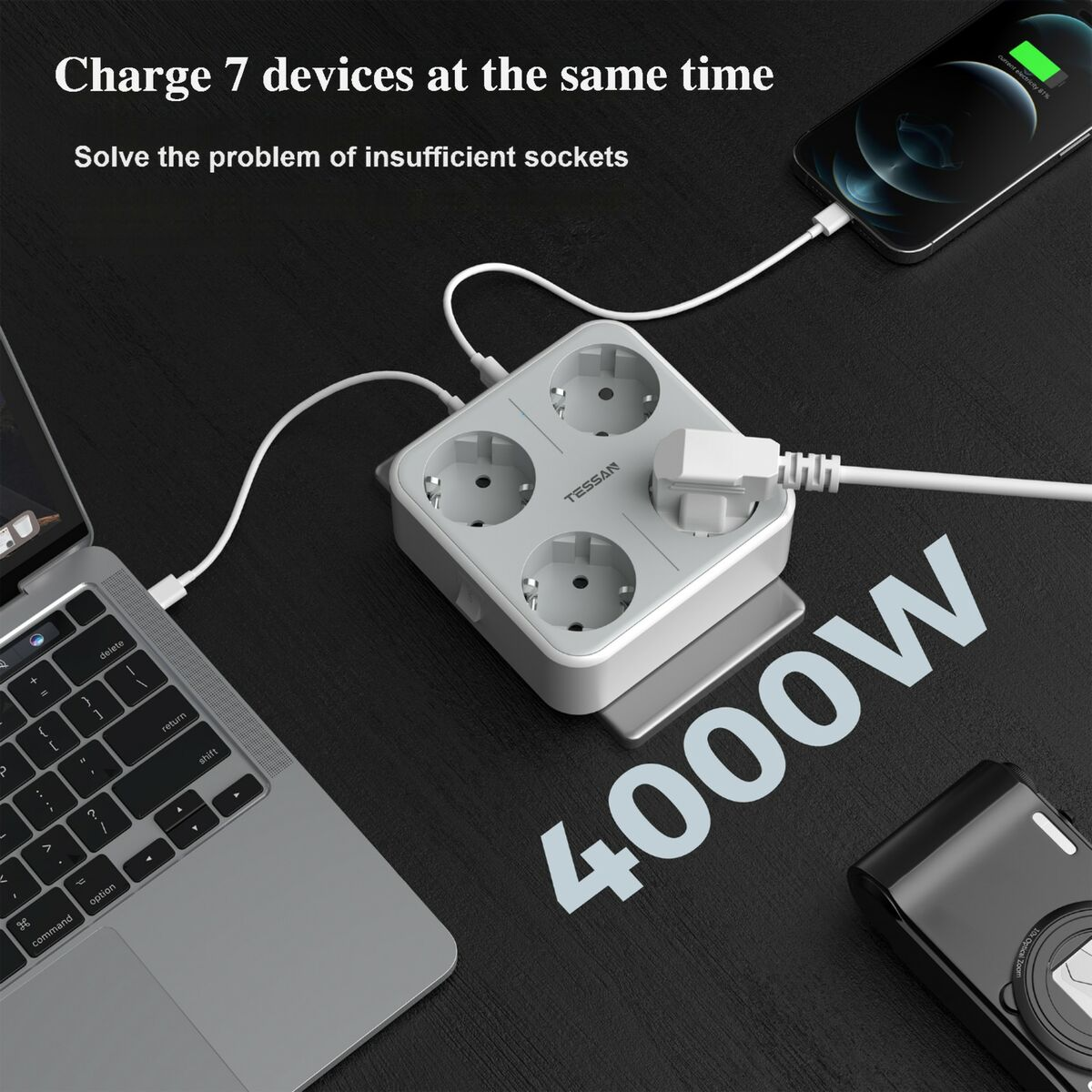 Una regleta cargando una computadora portátil y un teléfono. Se muestra el texto '4000W'. Otros dispositivos están conectados.