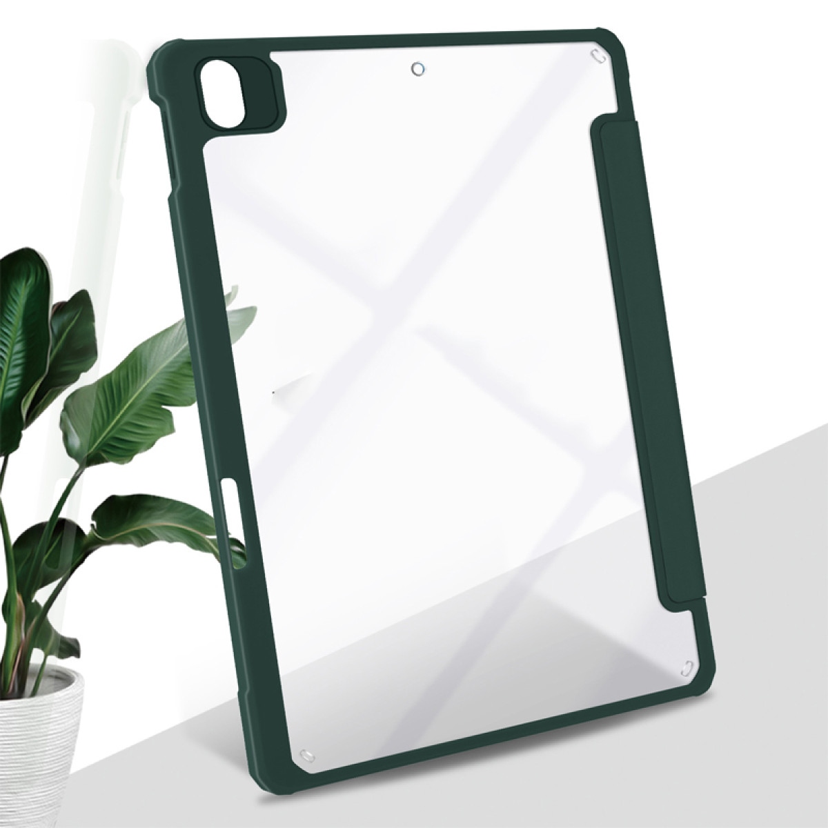 Grüne Tablet-Hülle mit transparentem Rücken und Pflanze im Topf im Hintergrund.