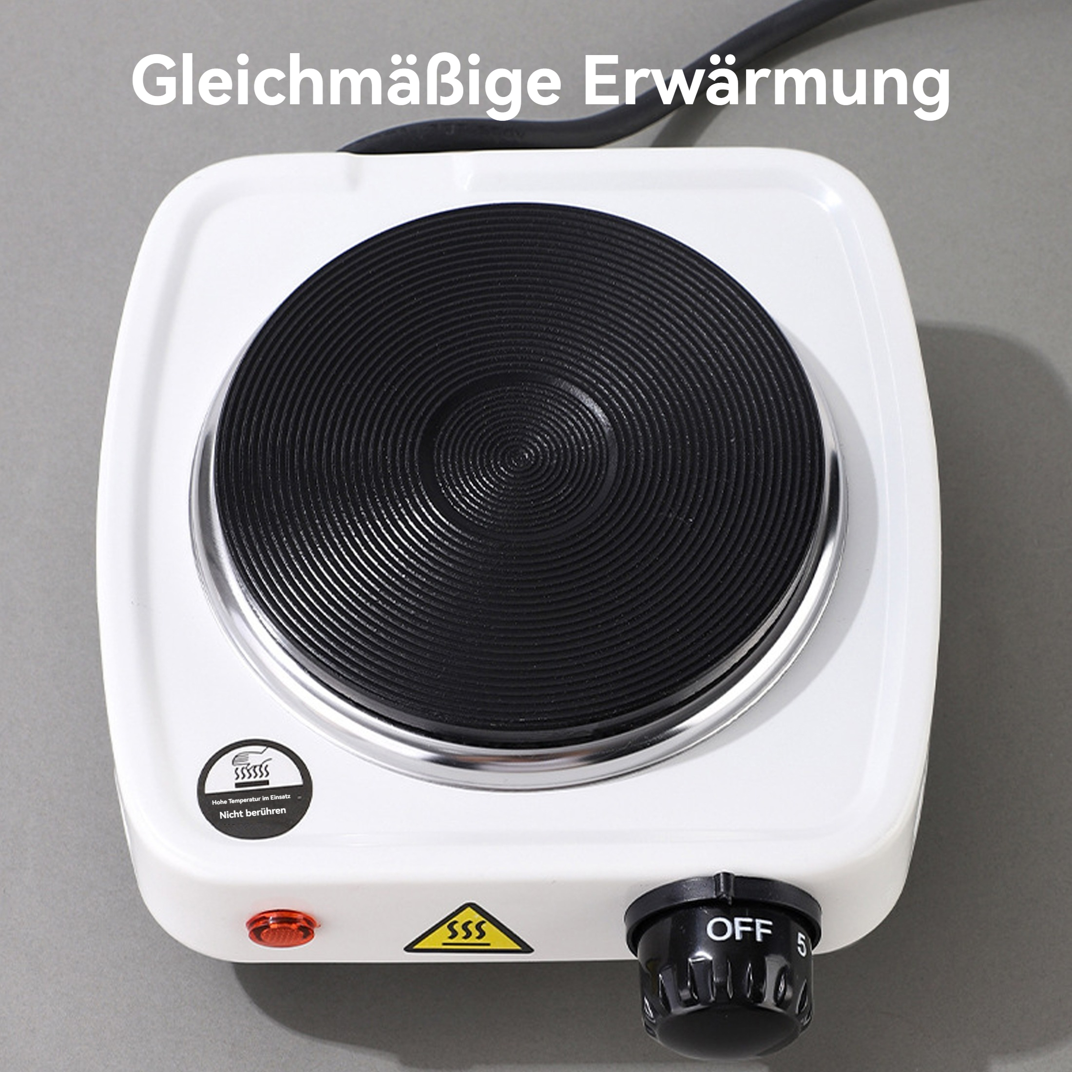 Ein weißer Elektroherd mit einem schwarzen Heizelement, einer roten Betriebsanzeige und einem 'Aus'-Schalter.