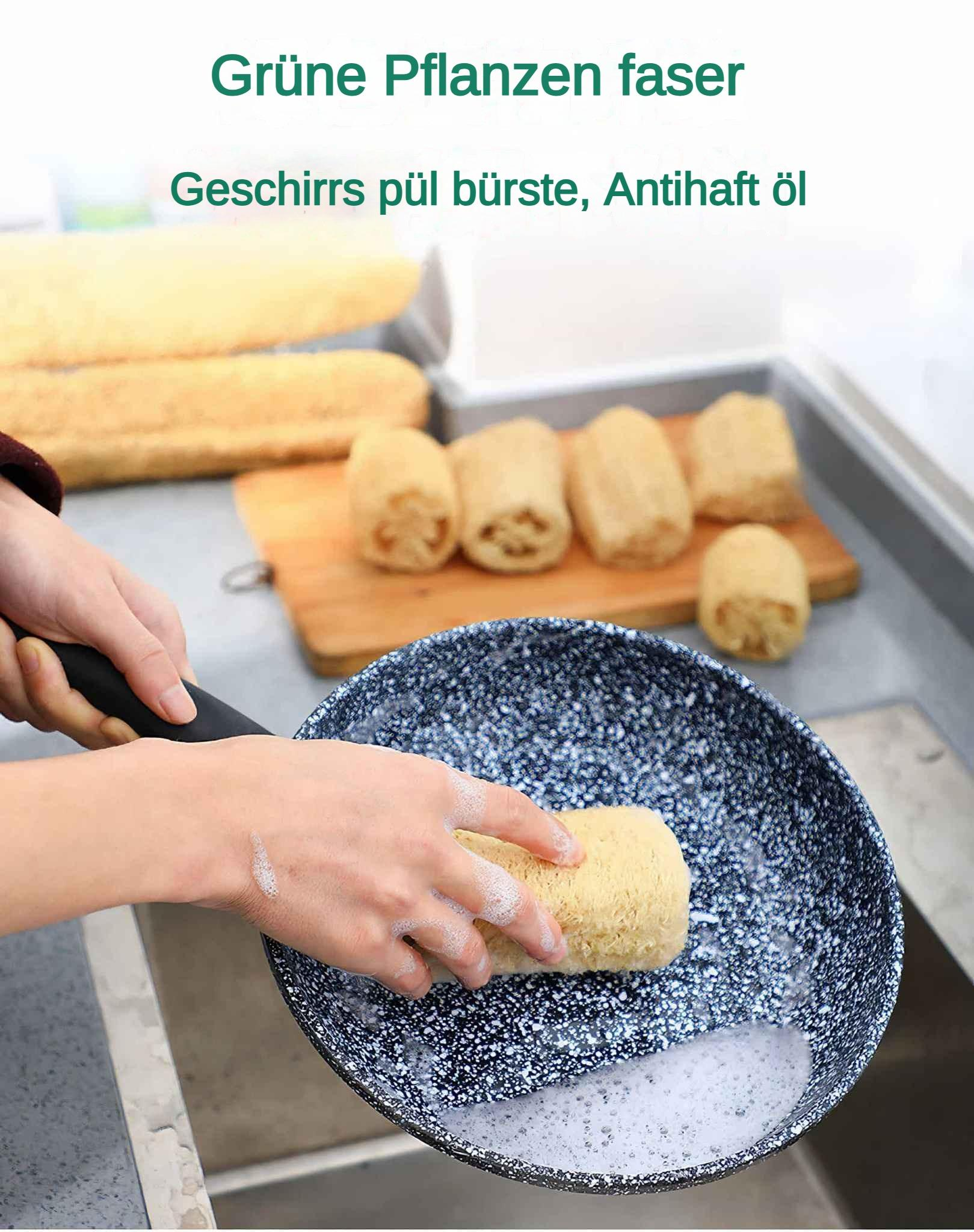 Eine Person wäscht eine Pfanne mit einer Bürste. Die Pfanne ist schwarz mit weißen Sprenkeln. Die Bürste ist gelb. Der Text lautet 'Grüne Pflanzenfaser'.