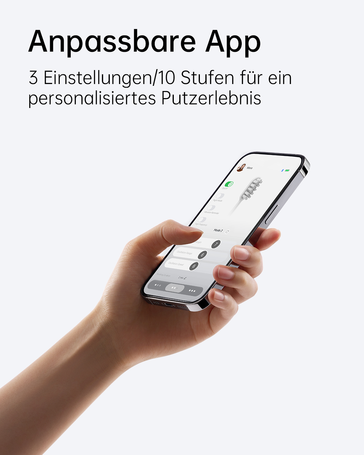Eine Hand, die ein Telefon hält, das die Benutzeroberfläche der Zahnbürsten-App mit Optionen für Einstellungen und Modi anzeigt.