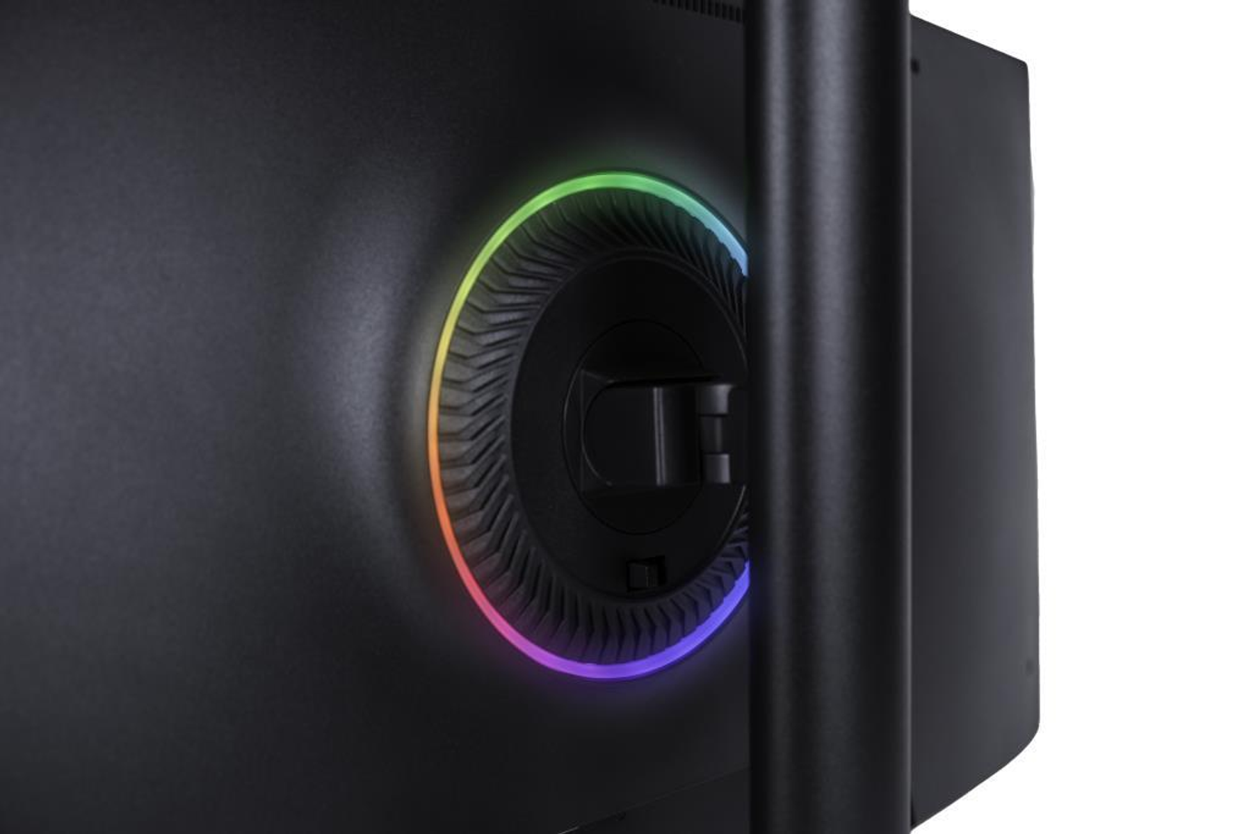 Zbliżenie tyłu czarnego monitora z kolorowym, okrągłym światłem wokół złącza podstawy.