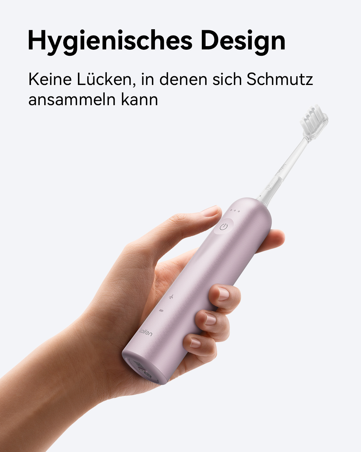 Eine Hand hält eine rosa Zahnbürste. Oben steht "Hygienisches Design".