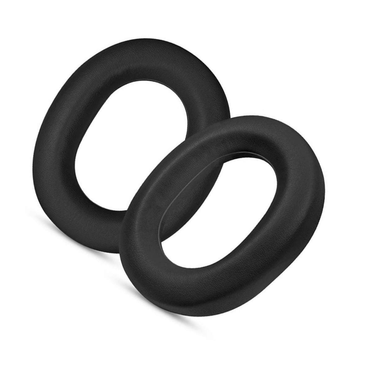 Due cuscinetti auricolari ovali neri con trama simile alla pelle su bianco.