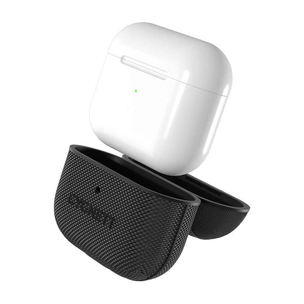 Funda blanca de AirPods sobre una cubierta negra texturizada con compartimentos.