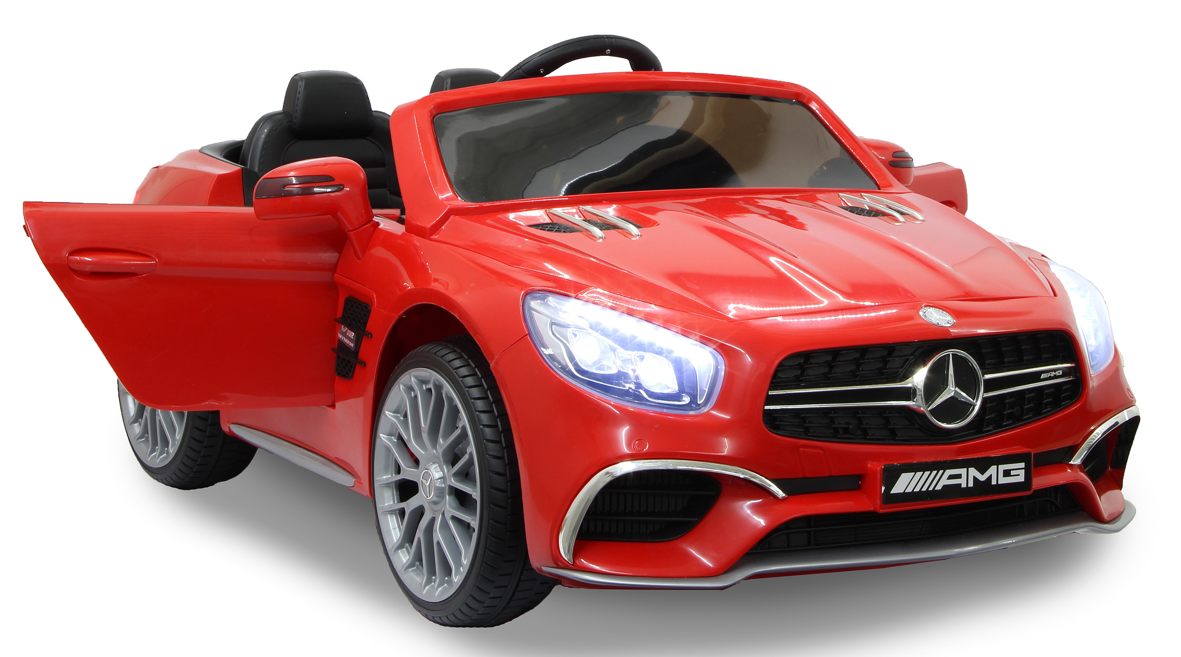 Ein roter Spielzeug Mercedes-Benz SL Roadster mit offener Tür. Scheinwerfer sind an, AMG-Logo sichtbar.