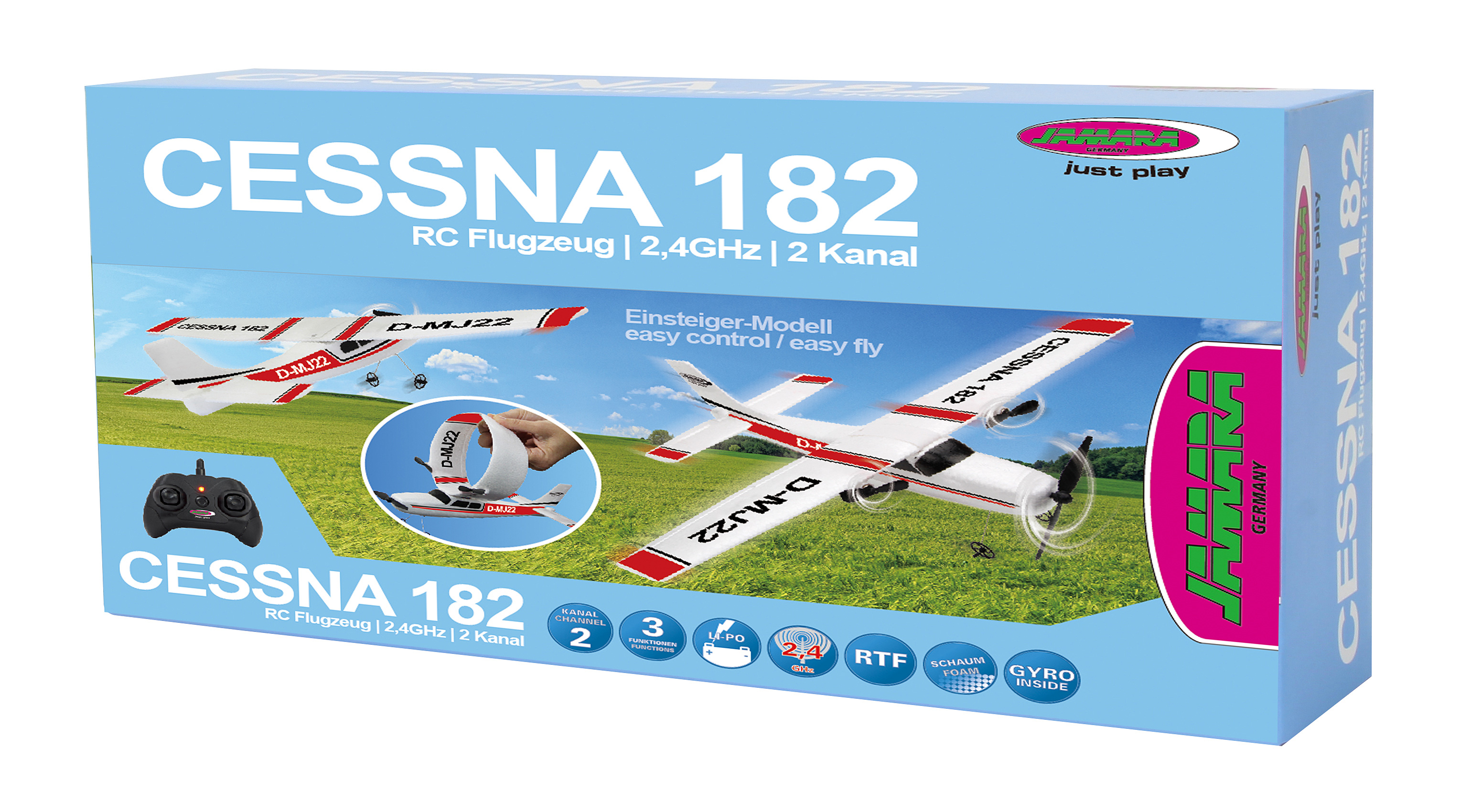 Eine blaue Schachtel mit einem Spielzeugflugzeug Cessna 182. Die Schachtel hat ein Flugzeugbild, Fernbedienung.