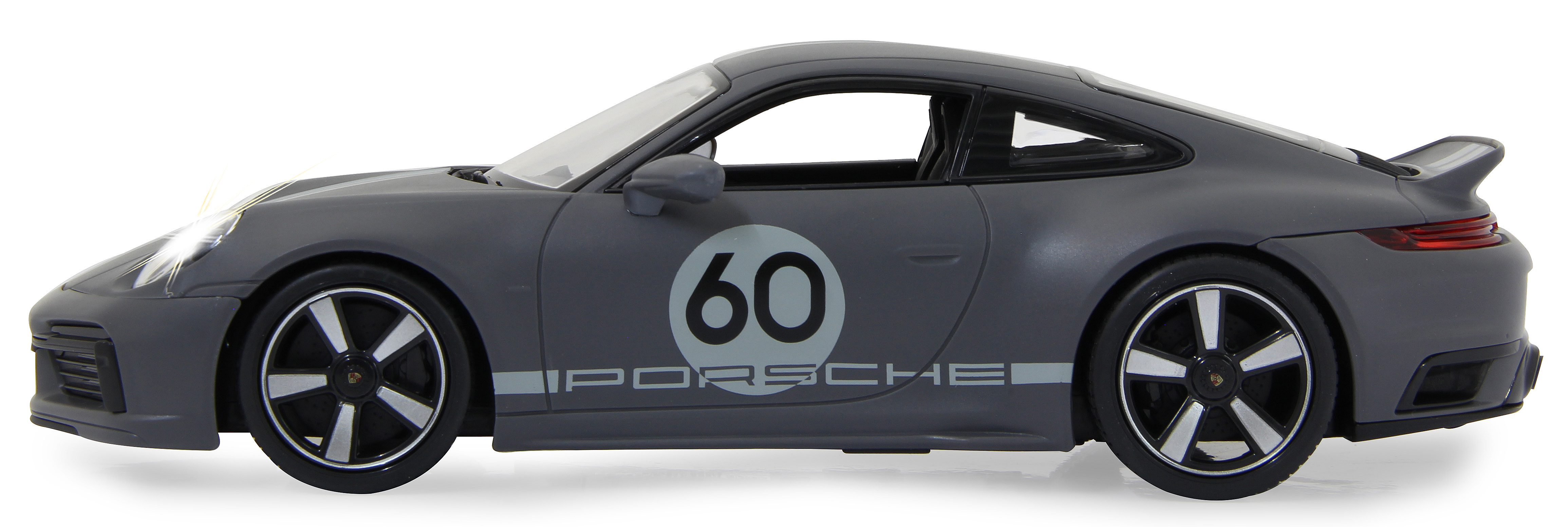 Graues Porsche 911 Spielzeugauto mit der Nummer 60 an der Seite. Weißer Hintergrund.
