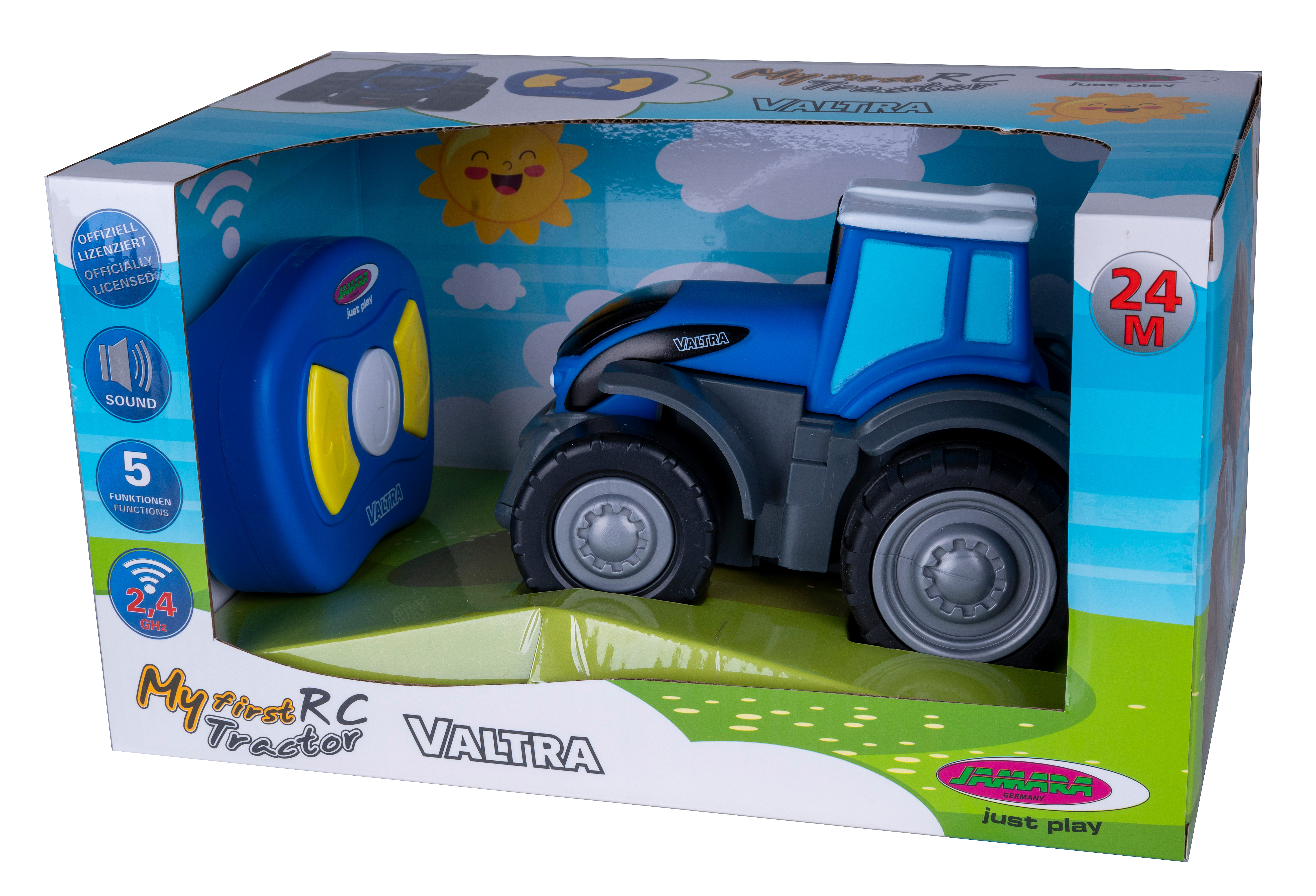 Ein Spielzeugtraktor in einer Box. Er ist blau und hat eine Fernbedienung.