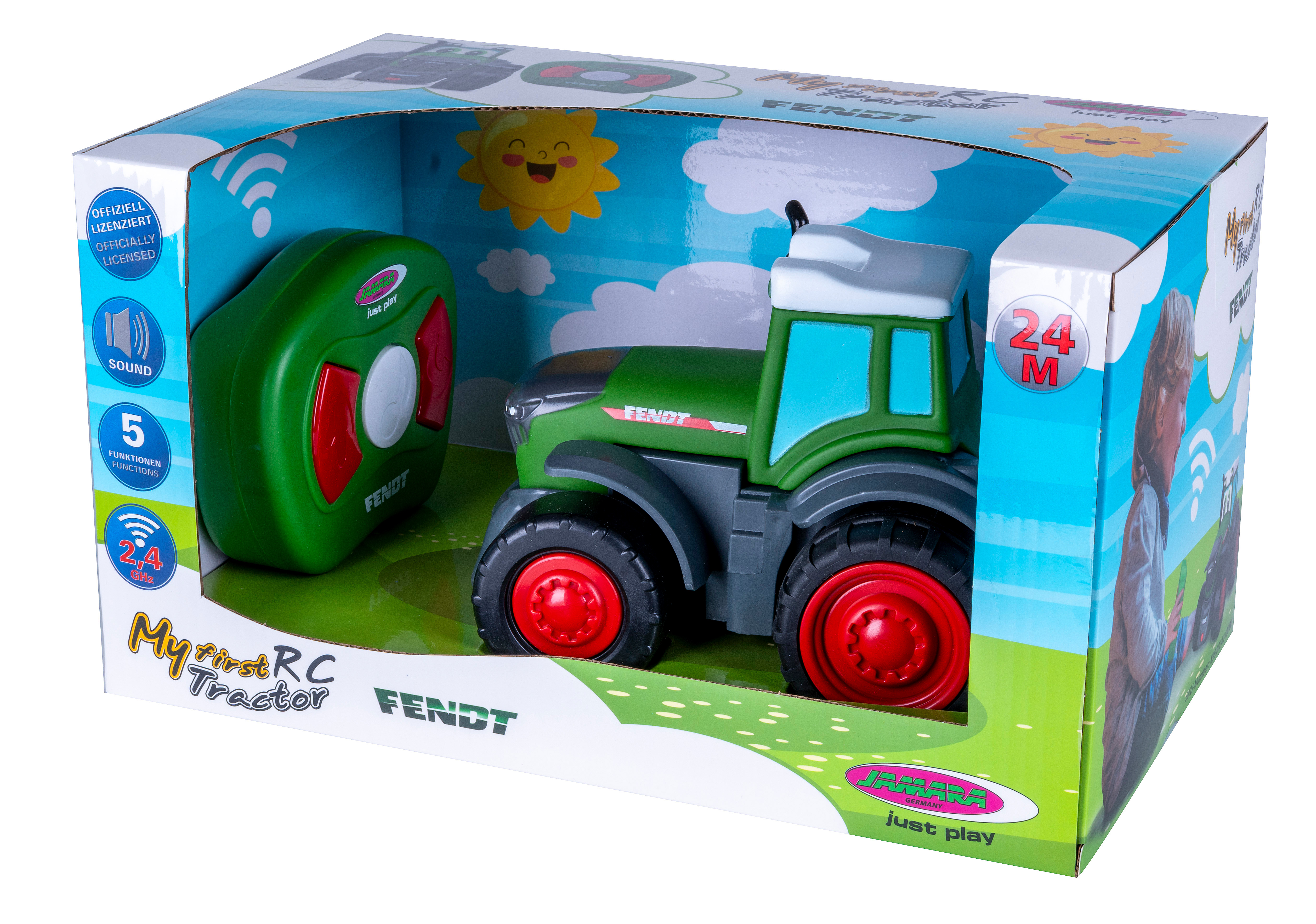 Ein Spielzeugtraktor in einer Box. Er ist grün und hat eine Fernbedienung. Die Box hat ein Cartoon-Design.