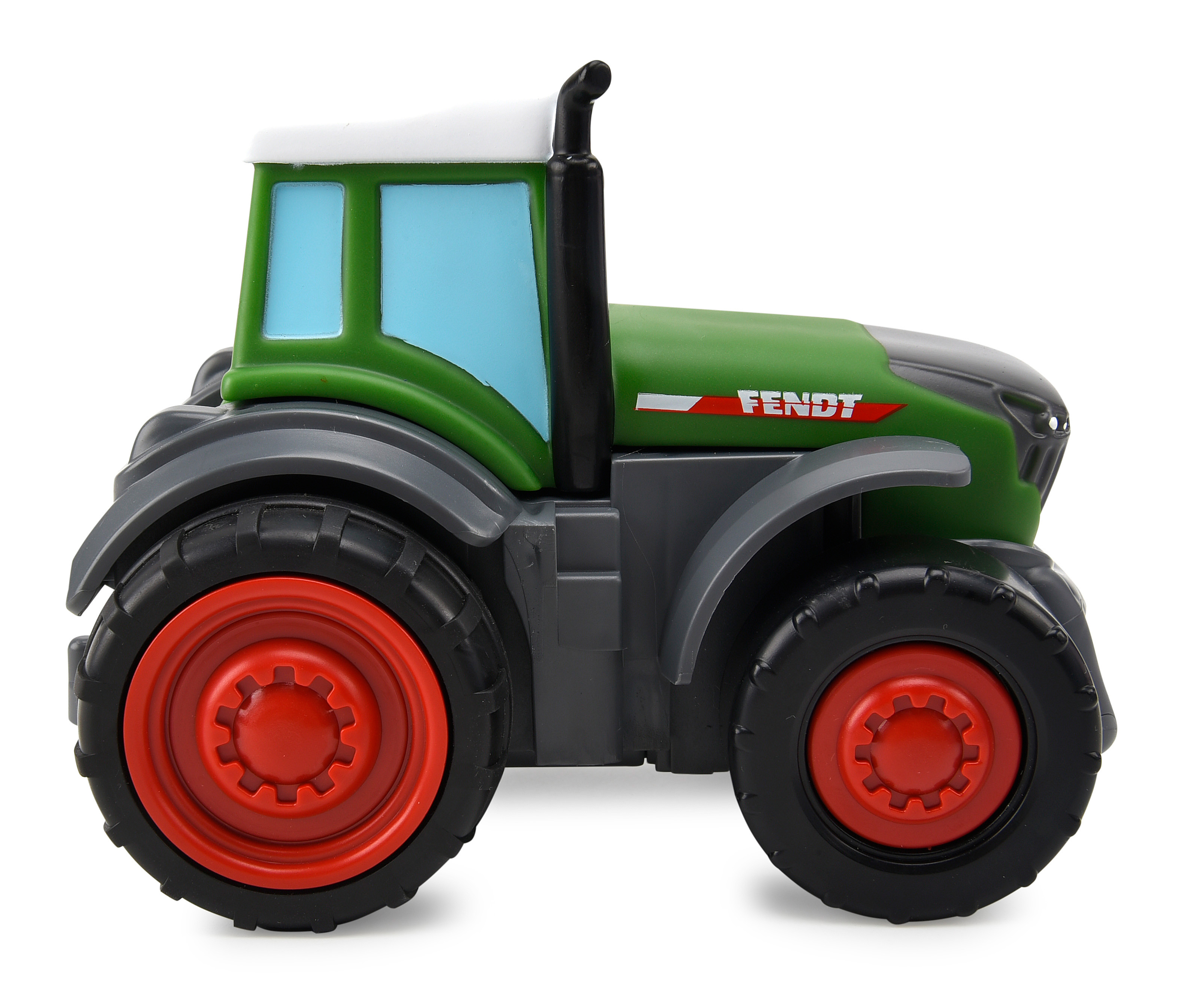 Grüner Spielzeugtraktor mit roten Rädern, weißem Dach und schwarzem Schornstein. Fendt steht auf der Seite.