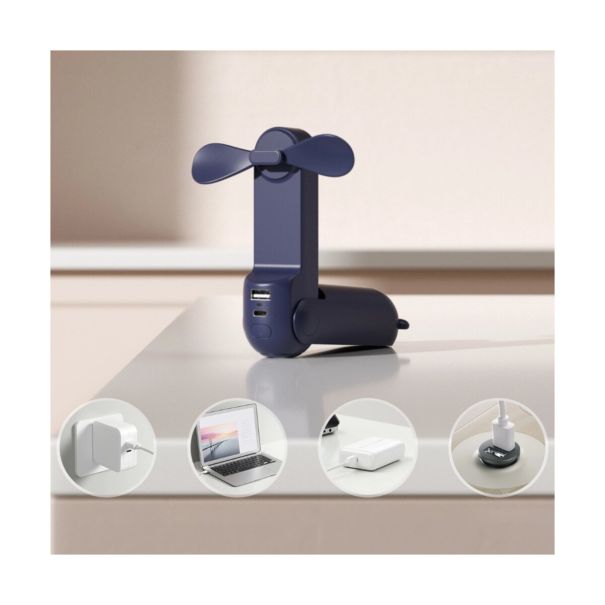 Blauer tragbarer Ventilator mit USB-Anschlüssen und Laptop, Ladegeräte in Kreisen auf einem Tisch.