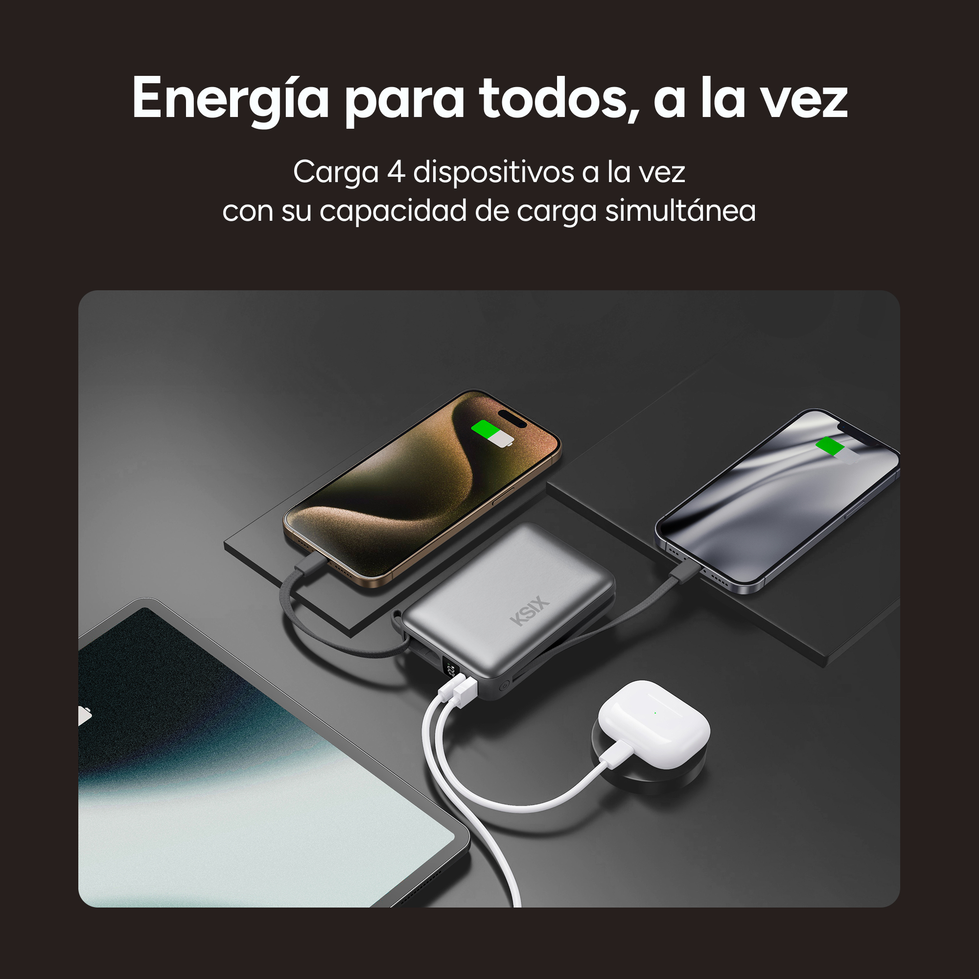 Tre dispositivi, tra cui un telefono e un tablet, si caricano contemporaneamente da un power bank su una superficie scura.