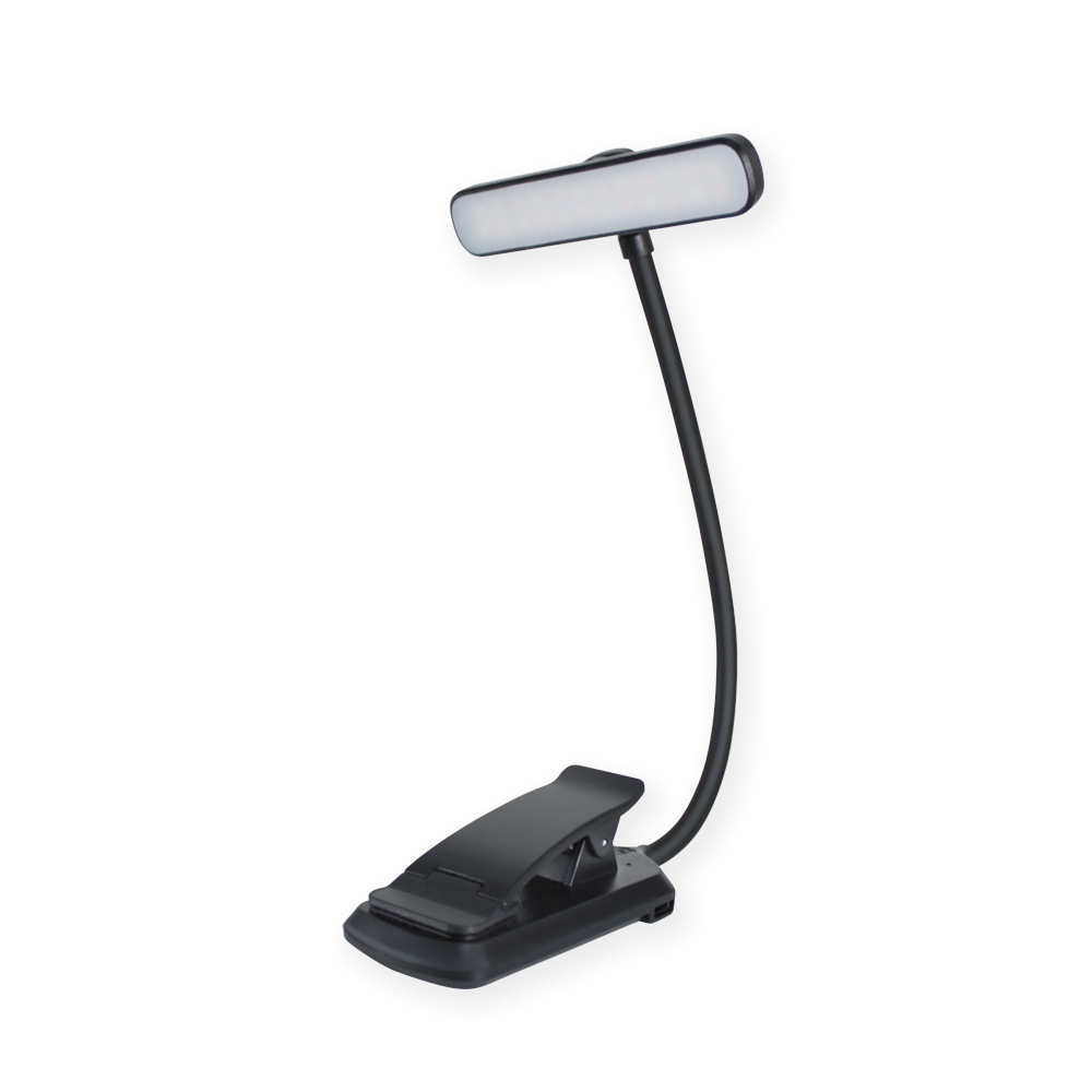 Una luce da lettura a LED nera con clip e collo flessibile. È su uno sfondo bianco.