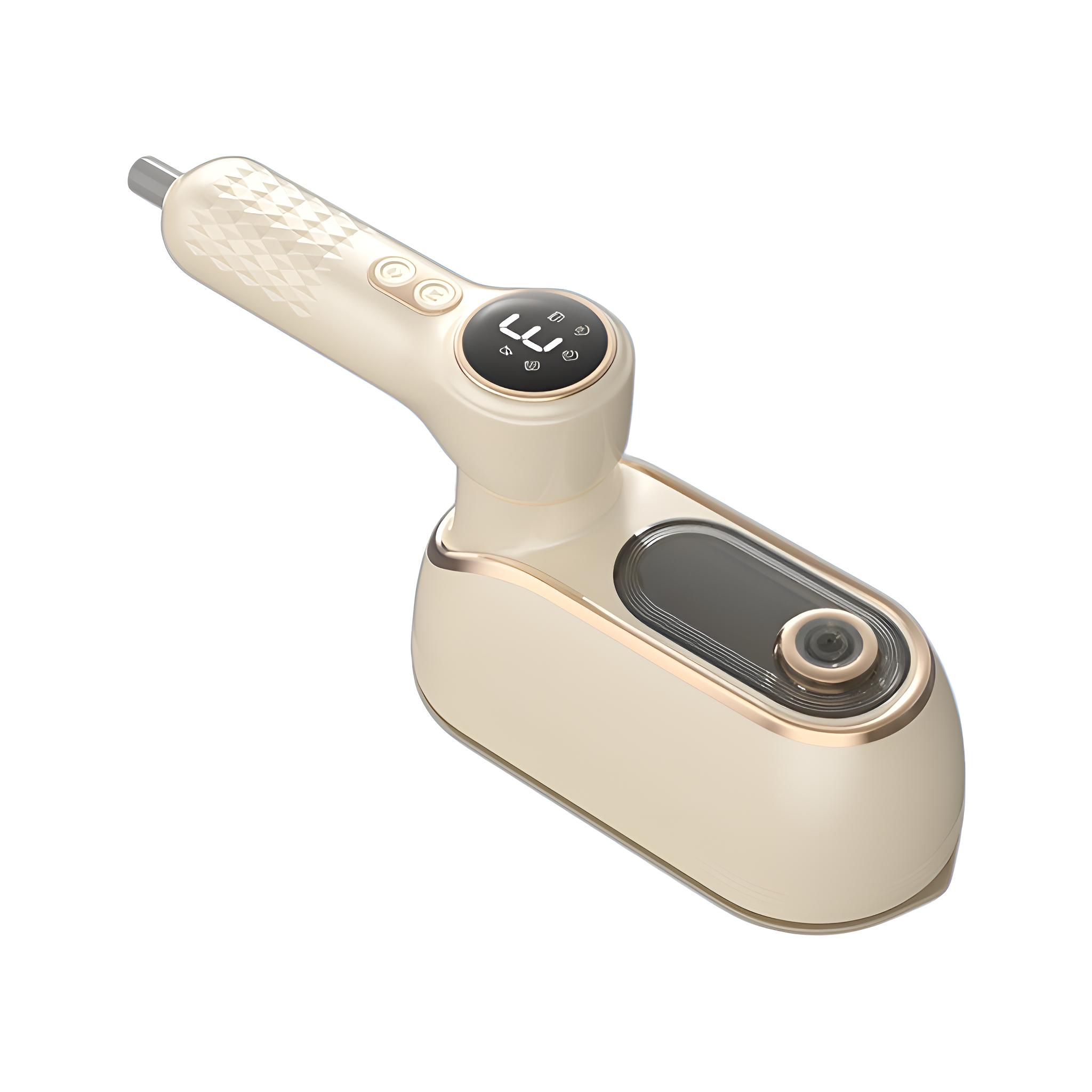 Ein Handgerät, beige und gold, mit Digitalanzeige und zwei Knöpfen oben.