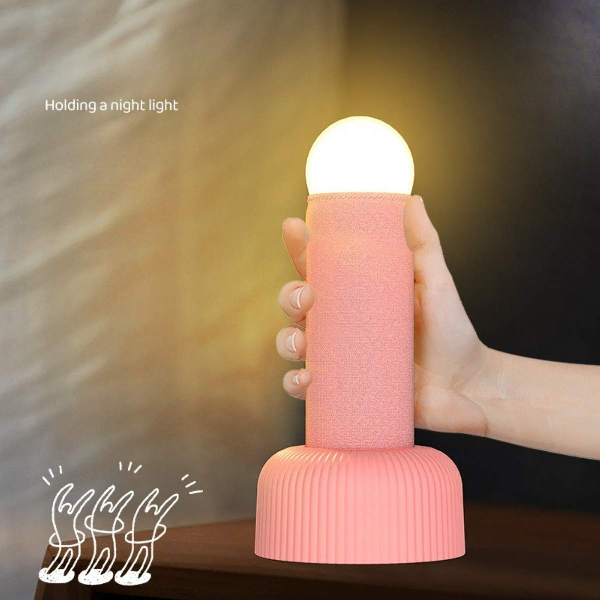 Eine Hand hält ein rosa Licht mit weißer Oberseite. Der Text lautet 'Holding a night light'. Drei Cartoon-Hände werden gezeigt.