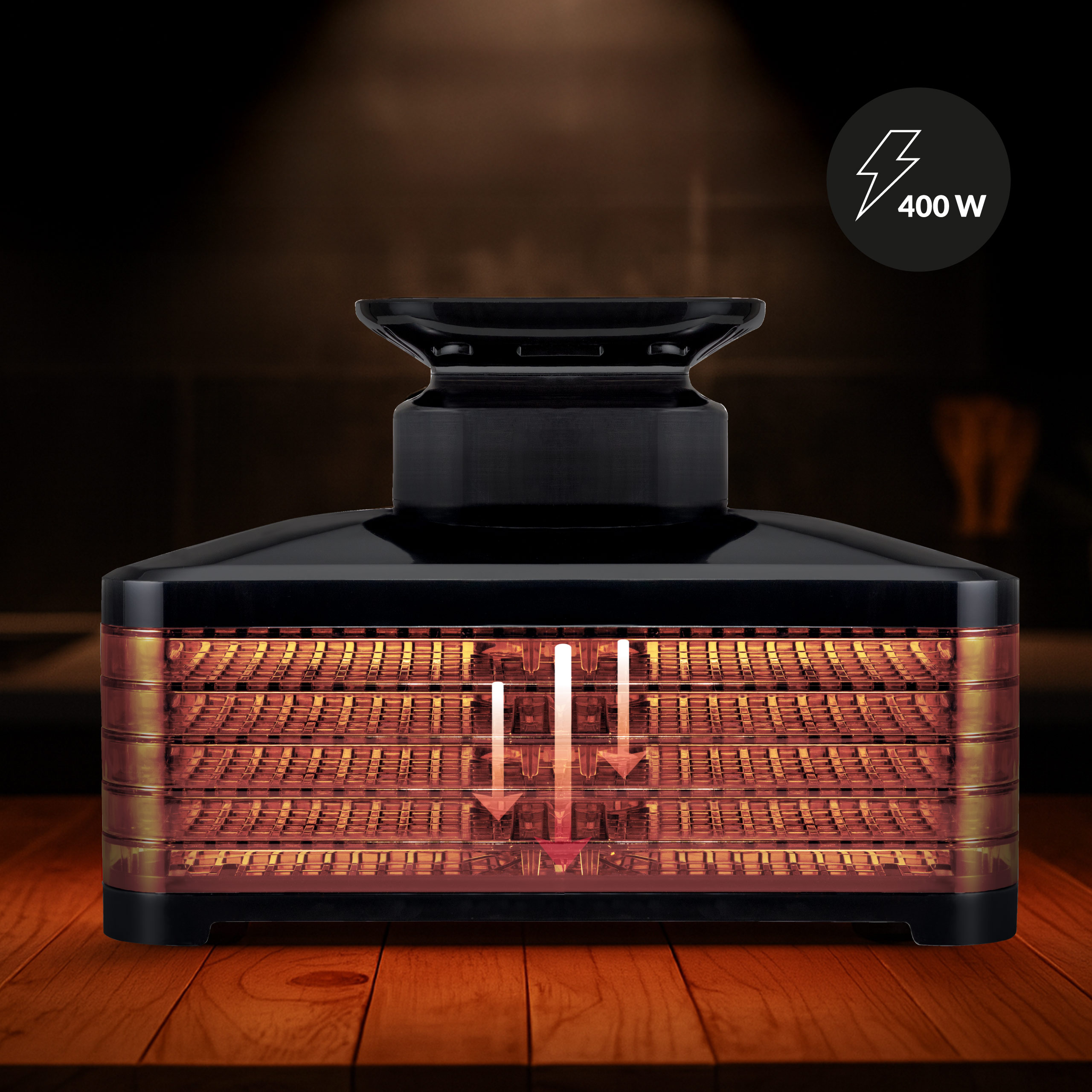 Czarny dehydrator do żywności z czterema tacami w środku, stoi na drewnianym stole i ma wskaźnik zasilania.