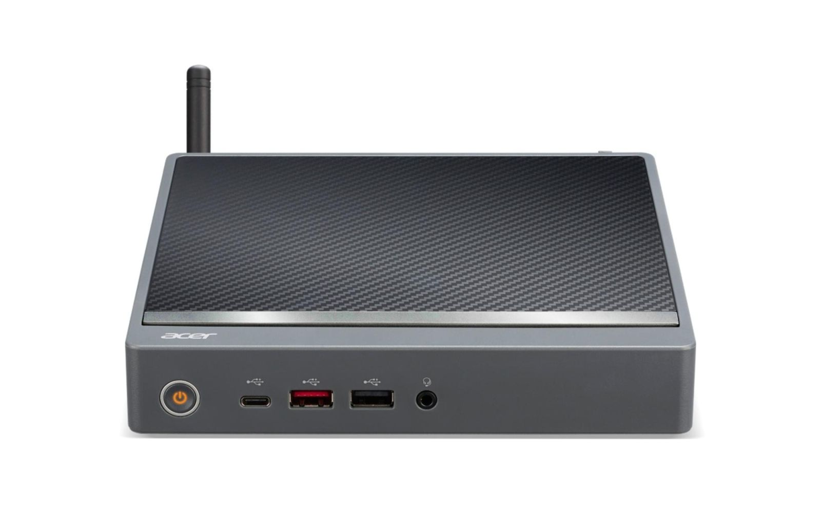 Mini PC Acer grigio con un top a motivi, porte, pulsante di accensione e un'antenna. Lo sfondo è bianco.