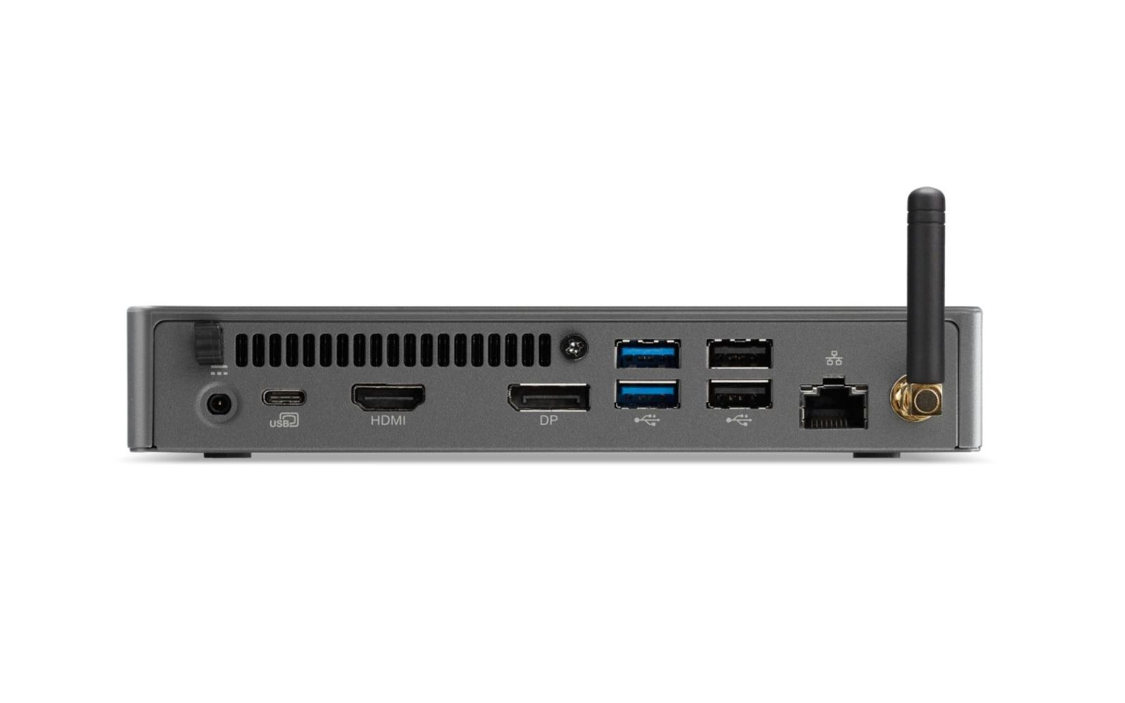 Vista posteriore di un mini PC grigio con porte, tra cui USB, HDMI e un'antenna. Lo sfondo è bianco.