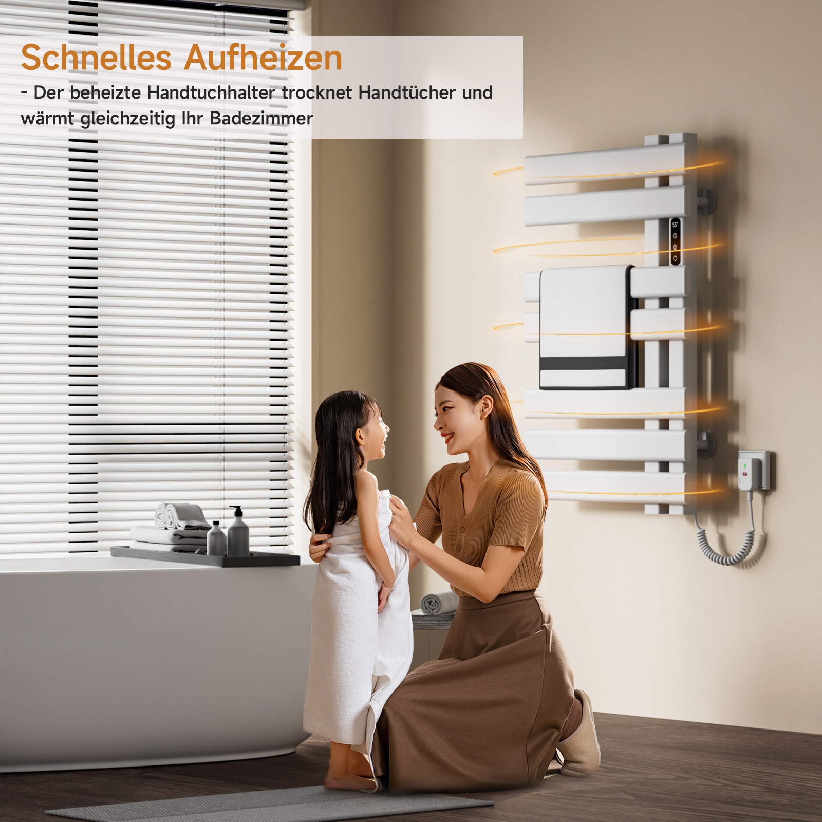 Mutter und Kind trocknen sich mit einem Handtuch in der Nähe des weißen Handtuchwärmers im Badezimmer ab.