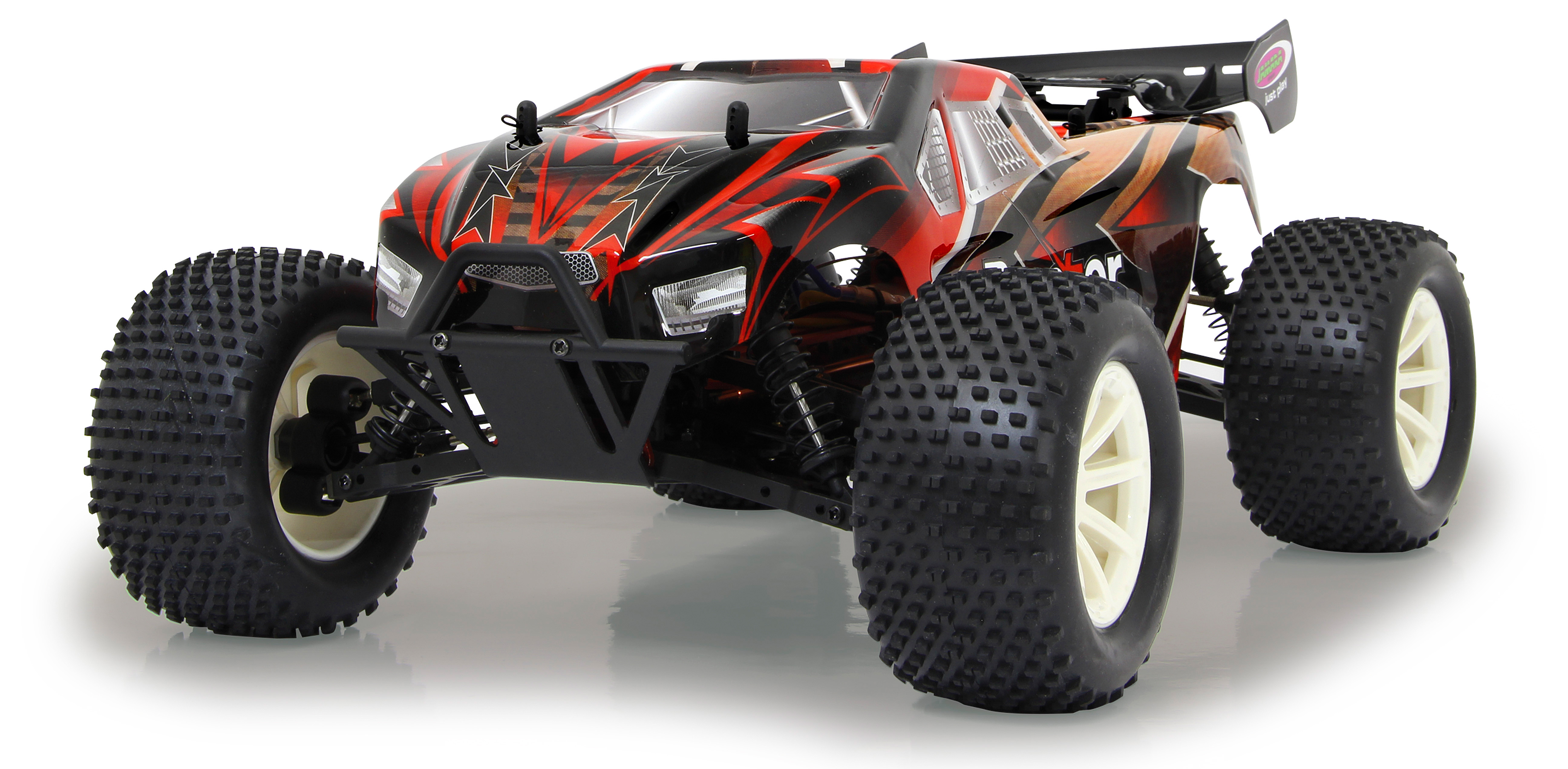 Ein rot-schwarzes RC-Car mit großen Offroad-Reifen, nach vorne abgewinkelt.