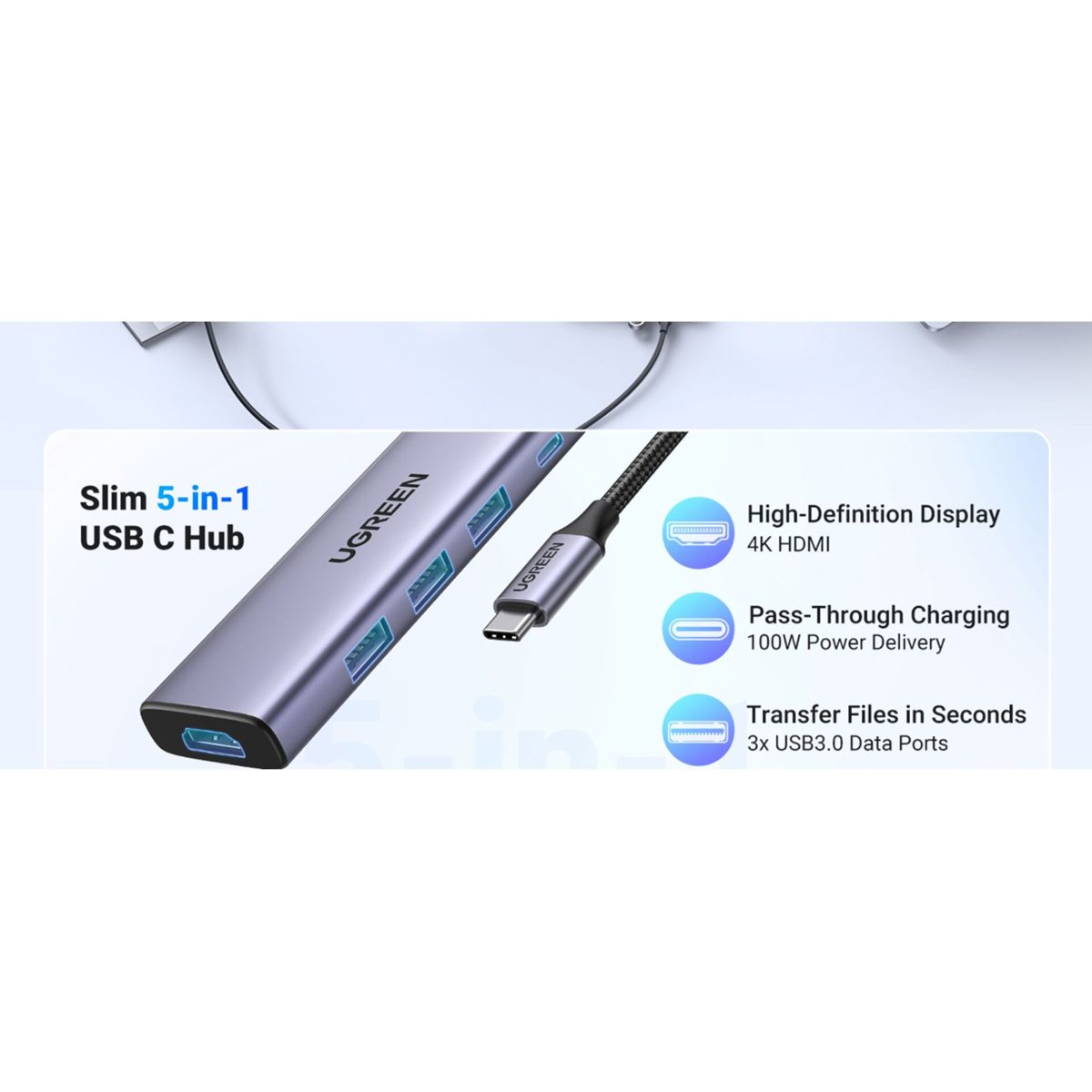 Srebrny hub USB z kablem, tekst opisujący funkcje. Posiada złącze USB-C i porty.