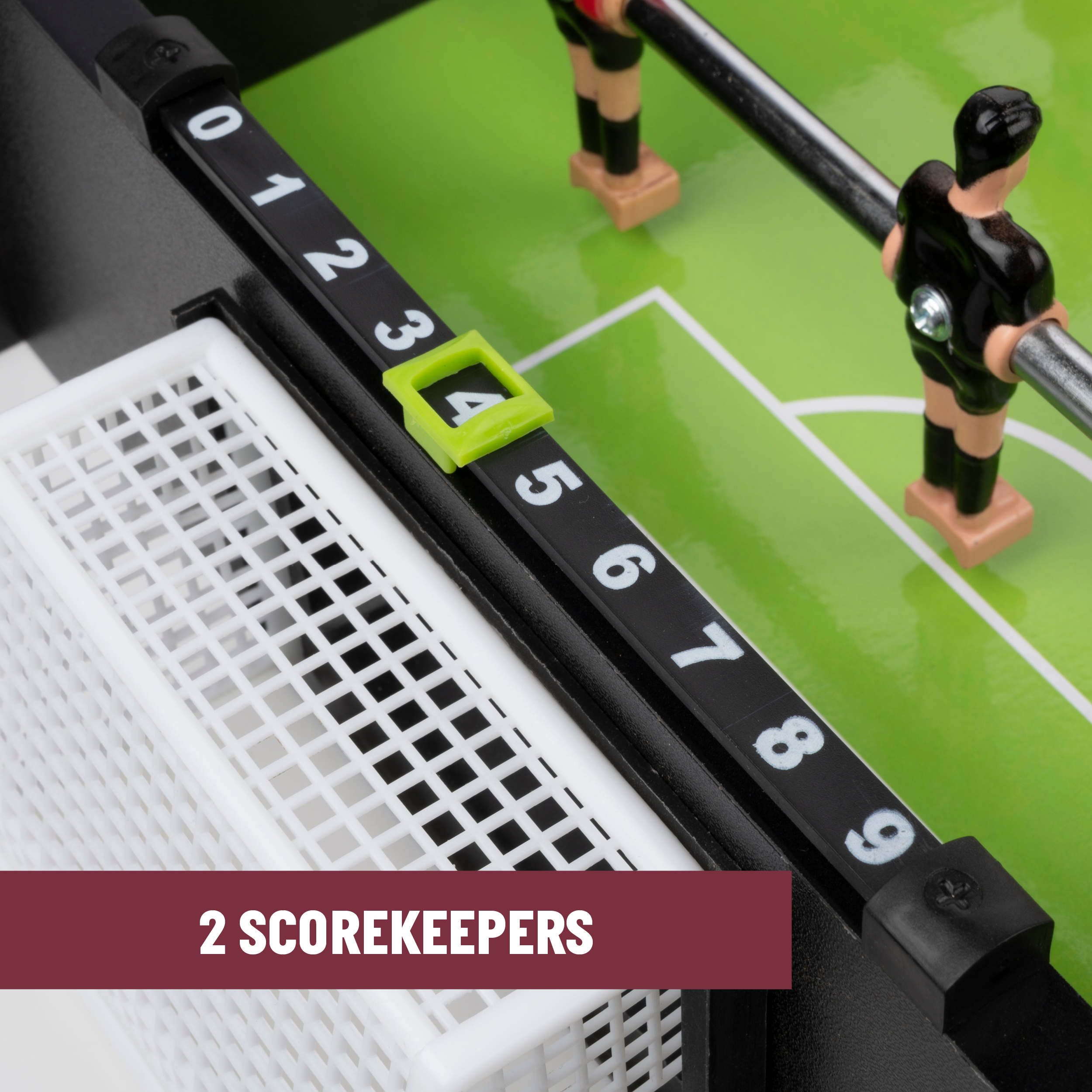 Close-up of a foosball table's score keepers. Numbers 0-9 are visible, with a white net.