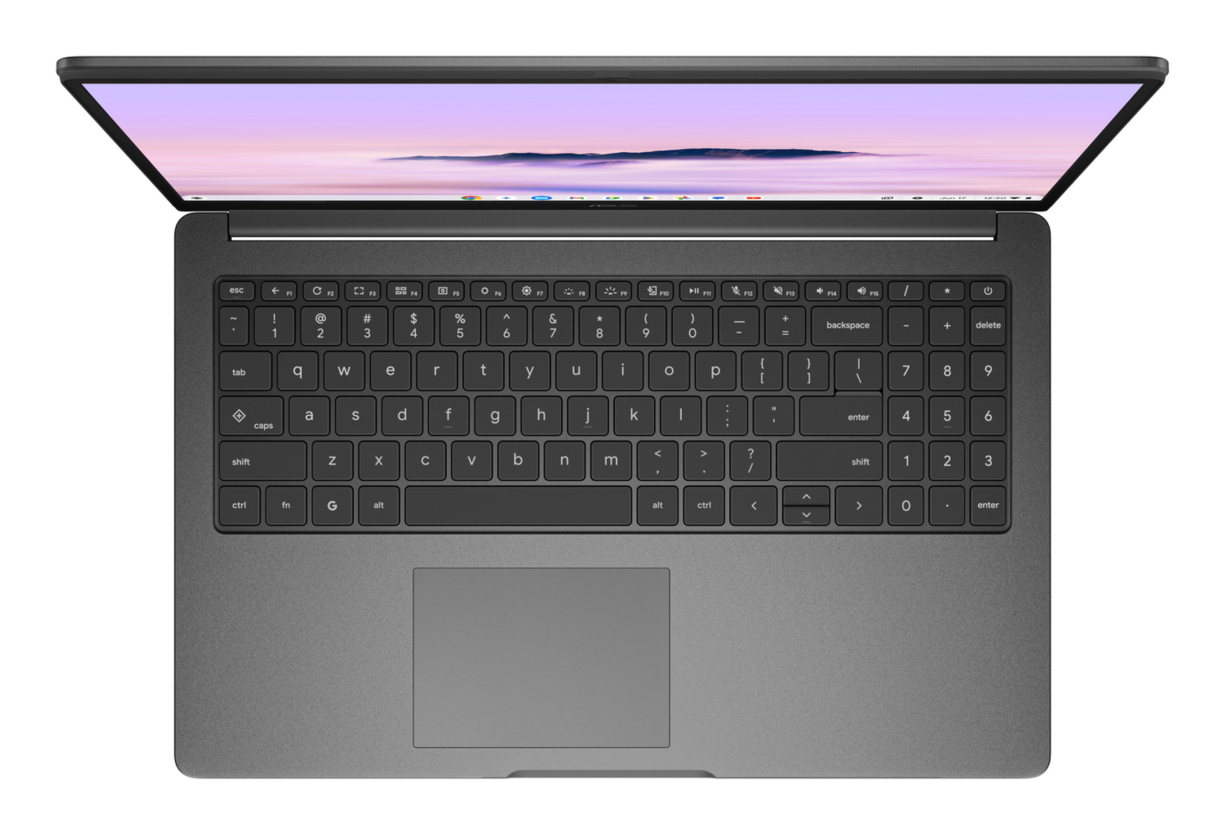 Portátil desde arriba. Teclado y panel táctil visibles. Pantalla muestra un paisaje colorido.